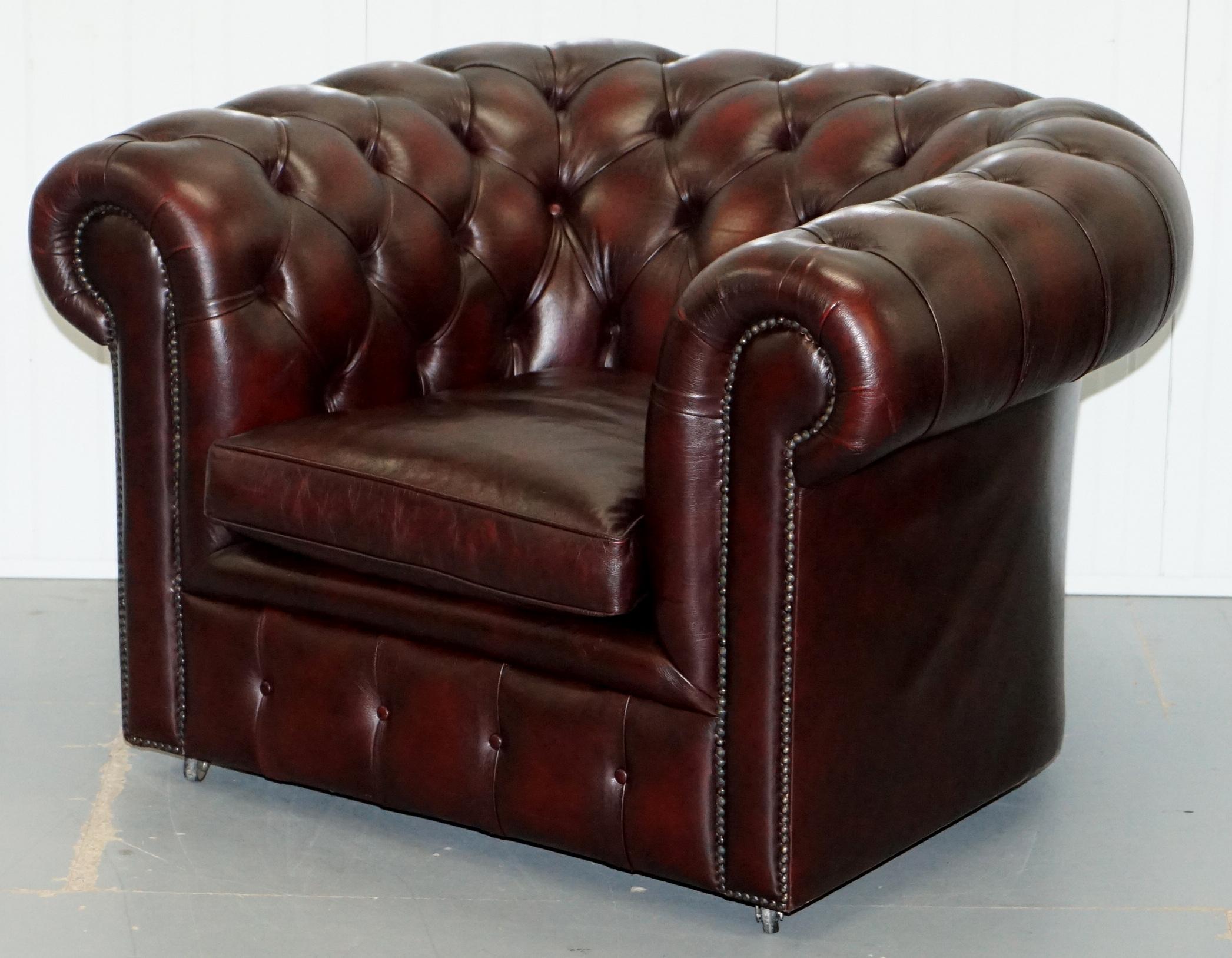 British Pair of Feather Filled Cushion Chesterfield Oxblood Leather Club Armchairs