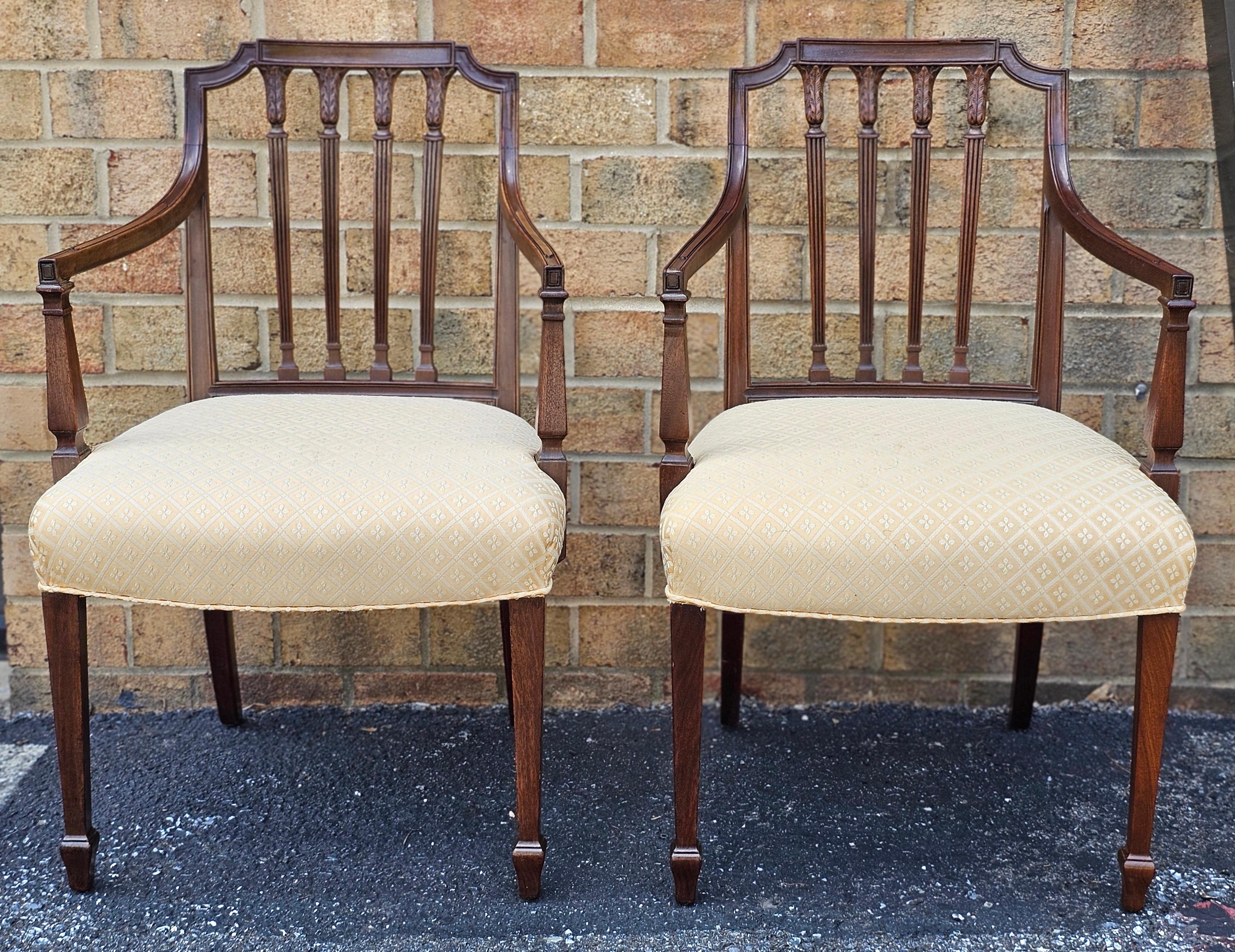 A Fine and Rare Pair of Federal Carved Mahogany Armchairs. Finely carved, stained and Upholstered. Newer upholstery. Attributed to Ephraim Haines (1775-1837) and Henry Connelly (1770-1826)
Philadelphia, Pennsylvania, Circa 1805
Measures 23