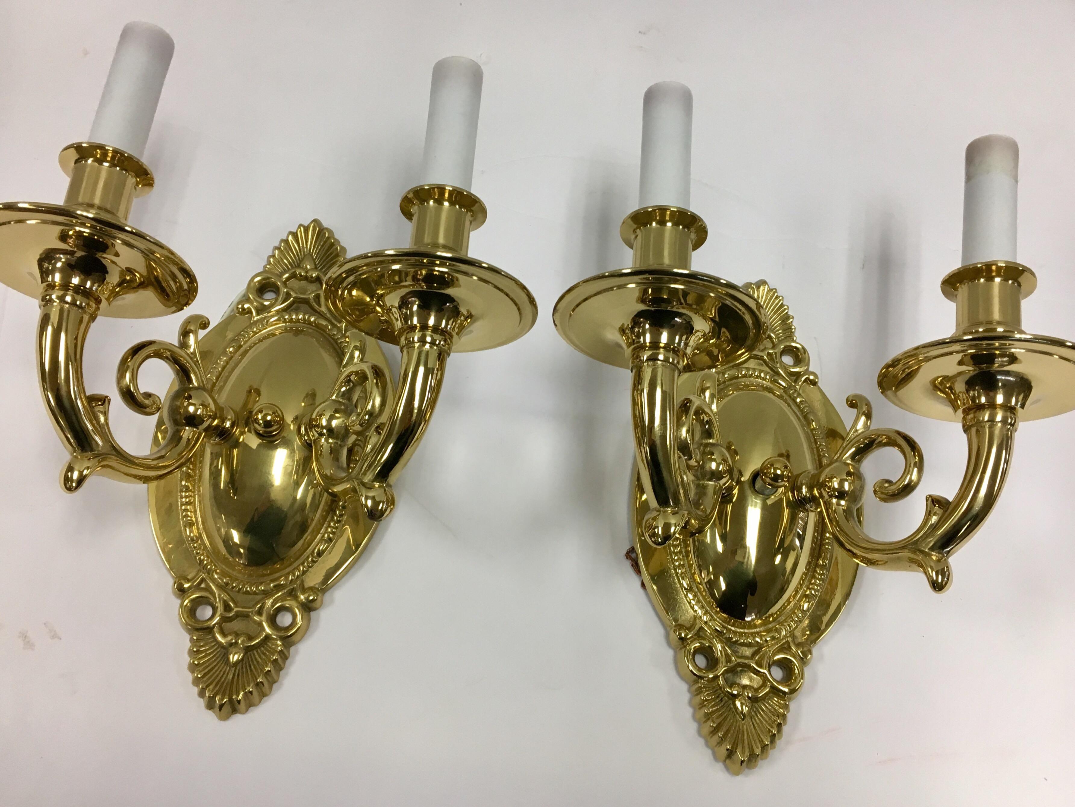Great pair of simple but elegant brass wall sconces. Wired for USA and in perfect working order.