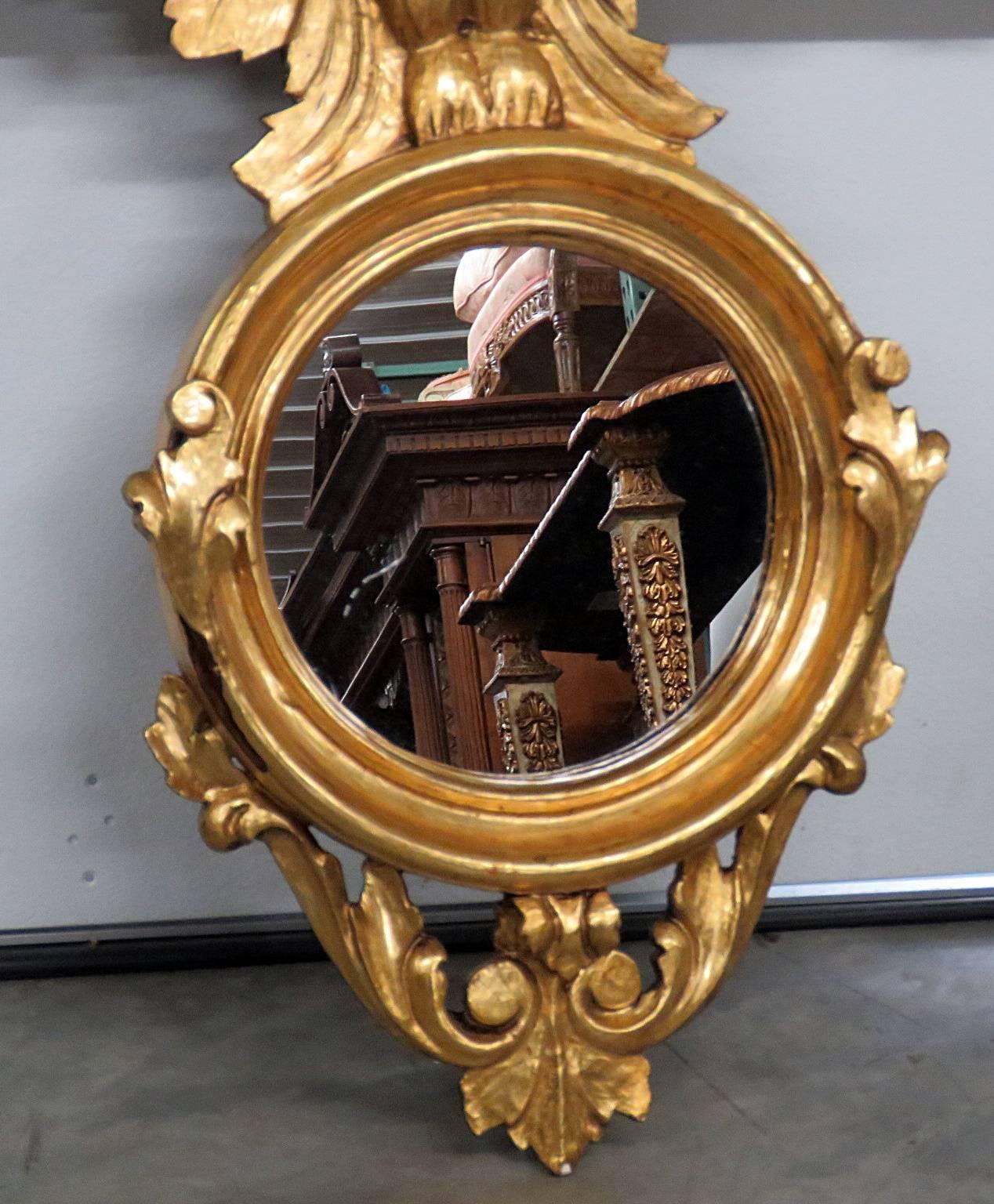 Pair of Federal style giltwood bullseye mirrors. Made in Spain.