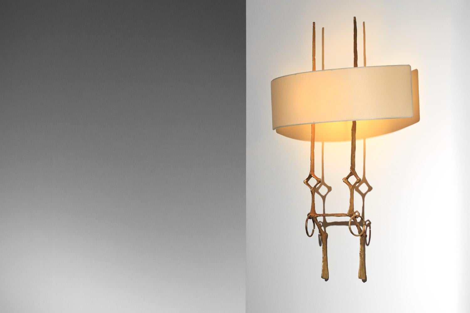 Schönes Paar französischer Wandlampen aus den 1950er Jahren von Designer und Künstler Felix Agostini, Modell 