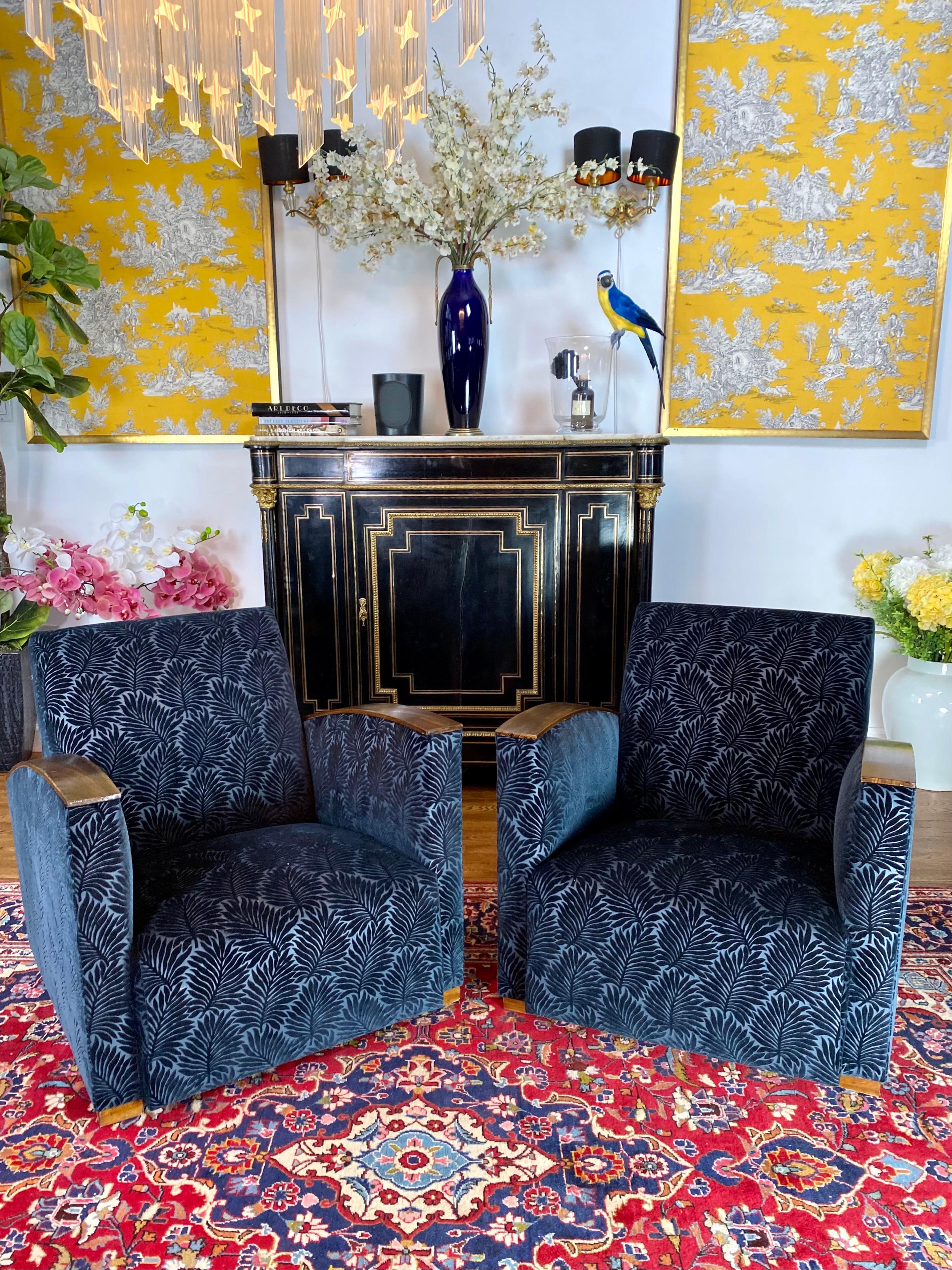1930 pair of French Art Deco club chairs from France. Beautifully restored and reupholstered by our inhouse master upholsterer with Blue Velvet Nobilis fabric. Excellent condition.