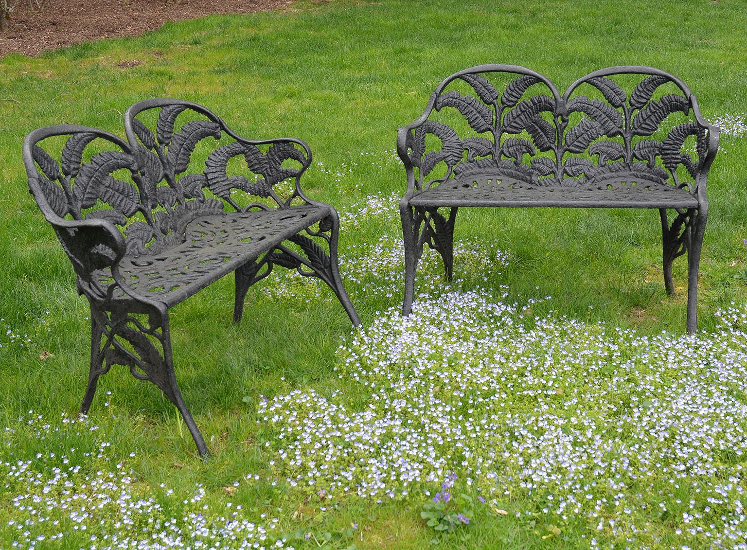 An exceptional pair of cast-iron settees in the fern pattern.

This pattern is a variation of a more common Fern pattern. This rare variation is known to have been produced by at least two American makers, but doesn’t seem to have been produced by