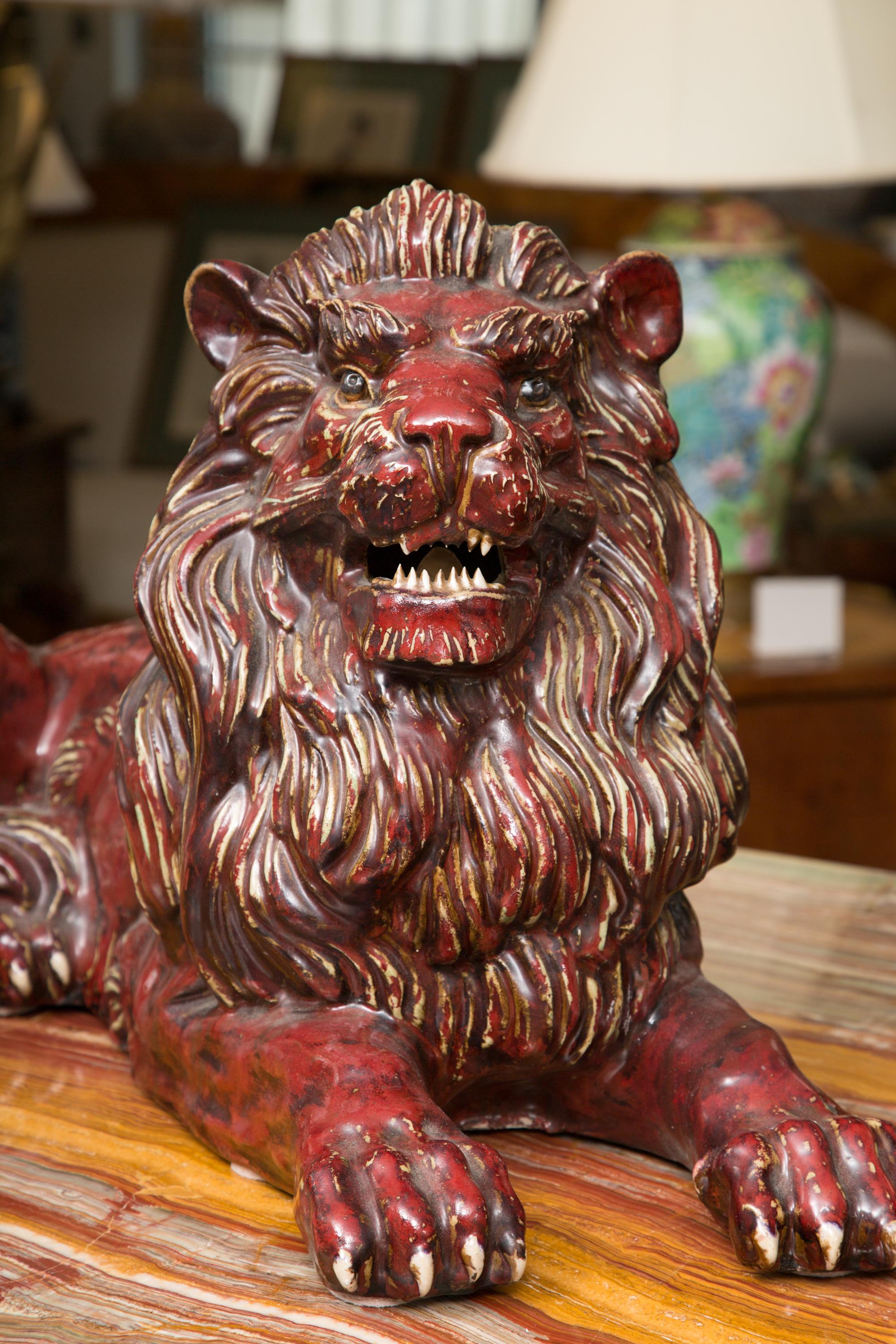 Pair of Fiance Glazed Recumbent Lions 1