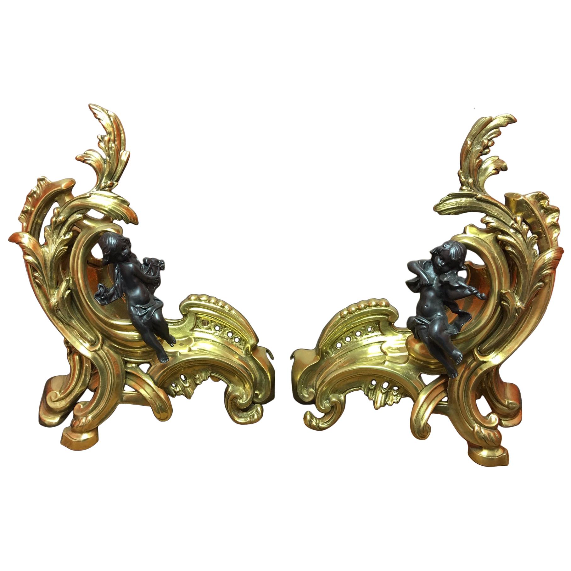 Pair of Figural Bronze Chenets with a Fender, Early 20th Century