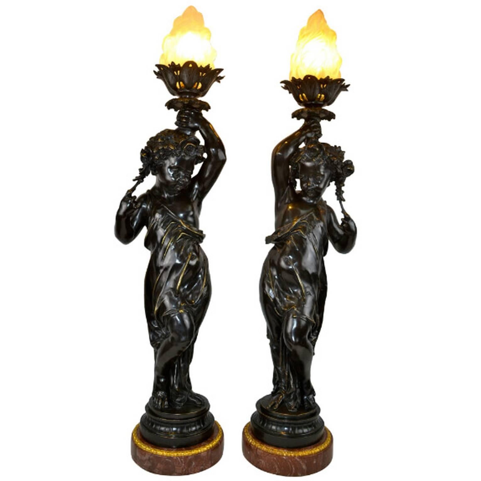 Pair of Figural Bronze Torcheres in the Manner of Clodion For Sale