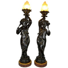 Antique Pair of Figural Bronze Torcheres in the Manner of Clodion