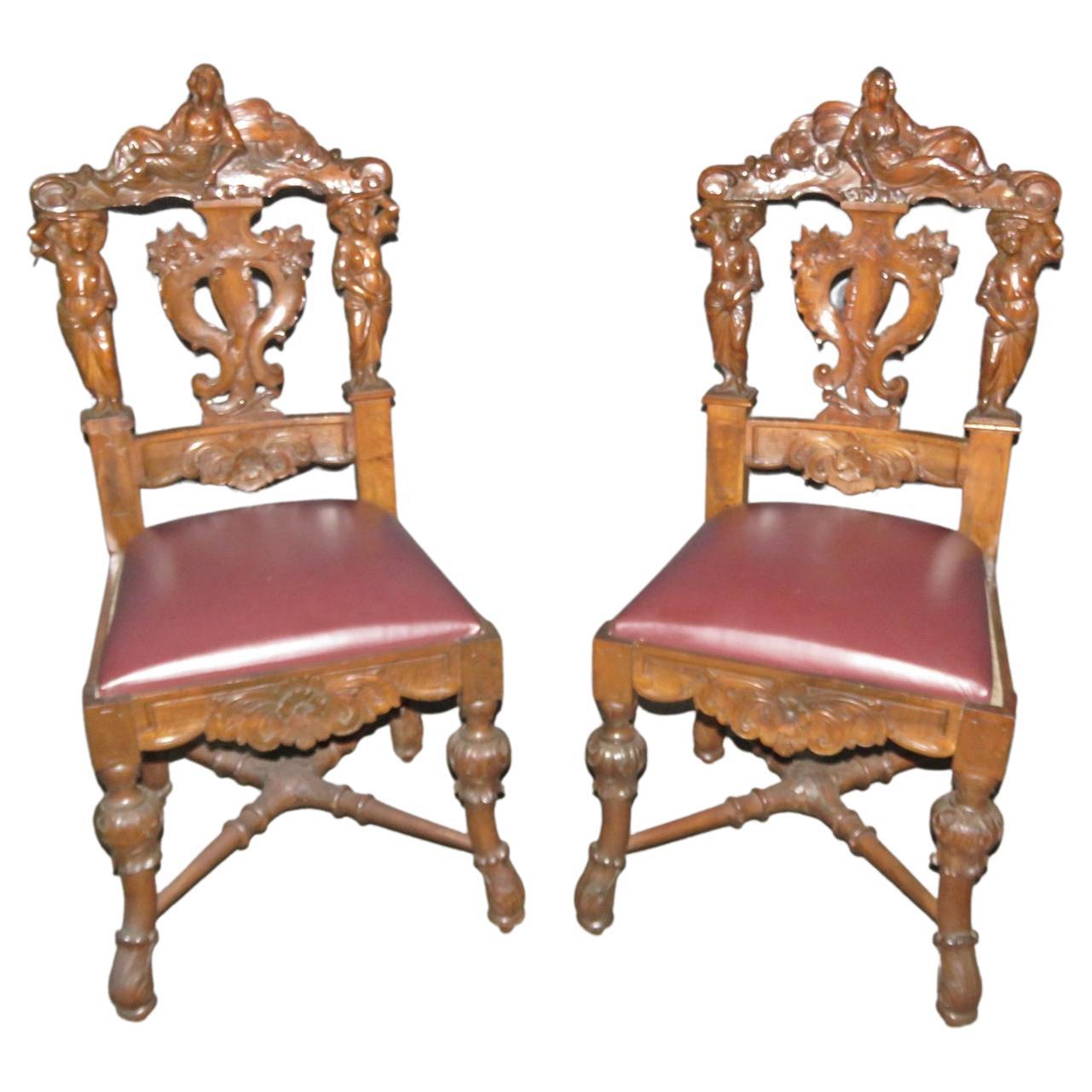Coppia di R.J. in legno di noce intagliato e figurato. Sedie rinascimentali in stile Horner, 1880 circa