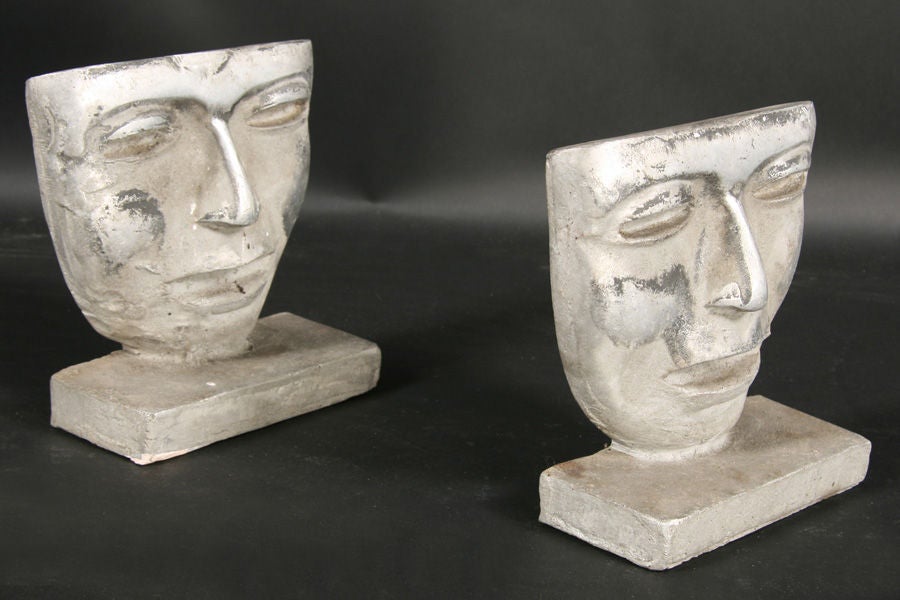 Interesting pair of midcentury figural custom aluminum bookends created by Philadelphia artist Samuel Joseph brown (1907-1994).