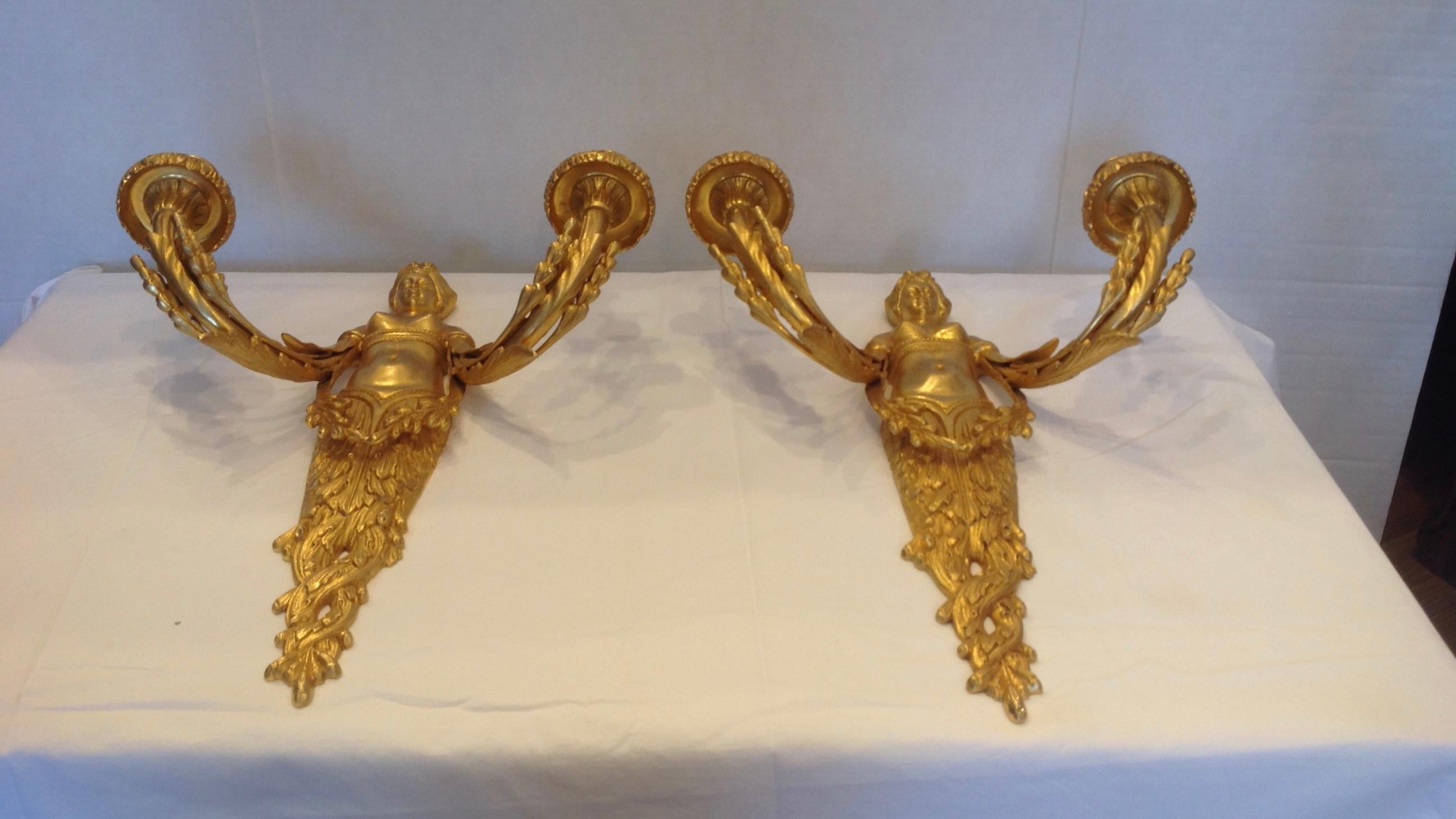 Crisp casting and good scale, appointed with neoclassic maidens,
each fitted for two candlesticks.
