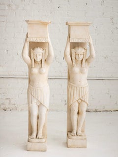 Pair of Figural Egyptian Style Marble Fireplace Surrounds