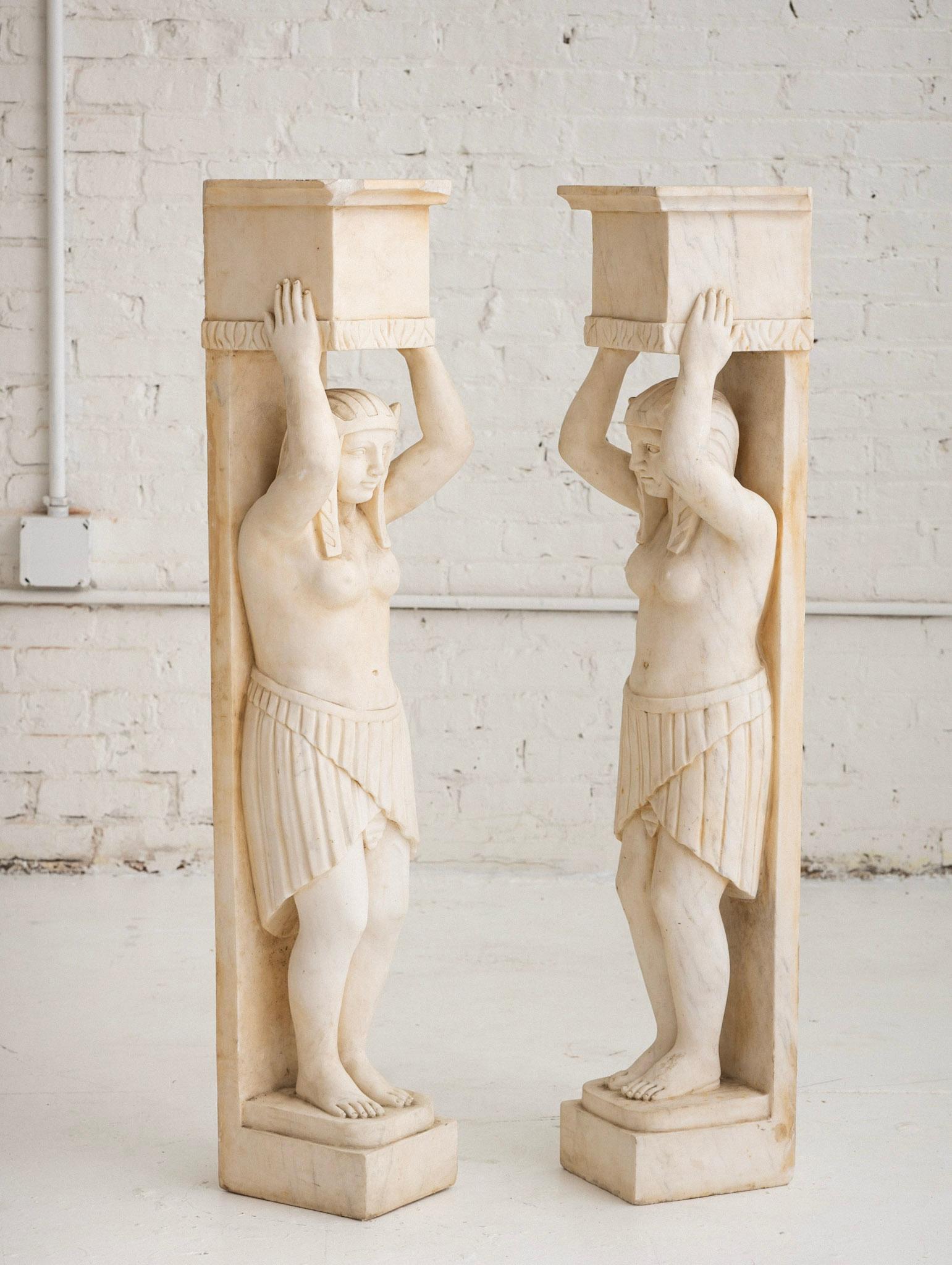 Pair of Figural Egyptian Style Marble Fireplace Surrounds In Good Condition In Brooklyn, NY