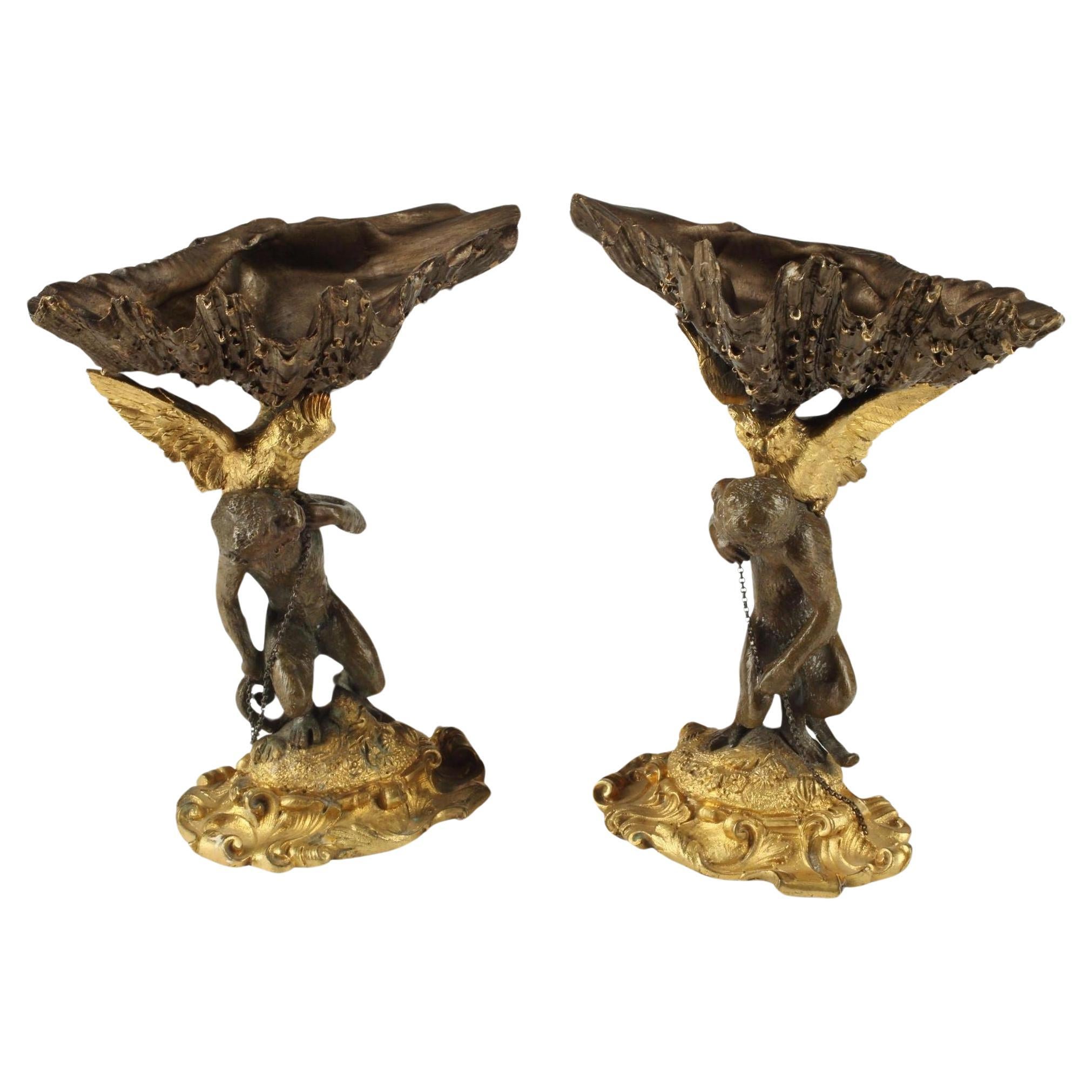 Pair of Figural Patinated & Gilt Bronze Garnitures with Shell-Form Bowl For Sale