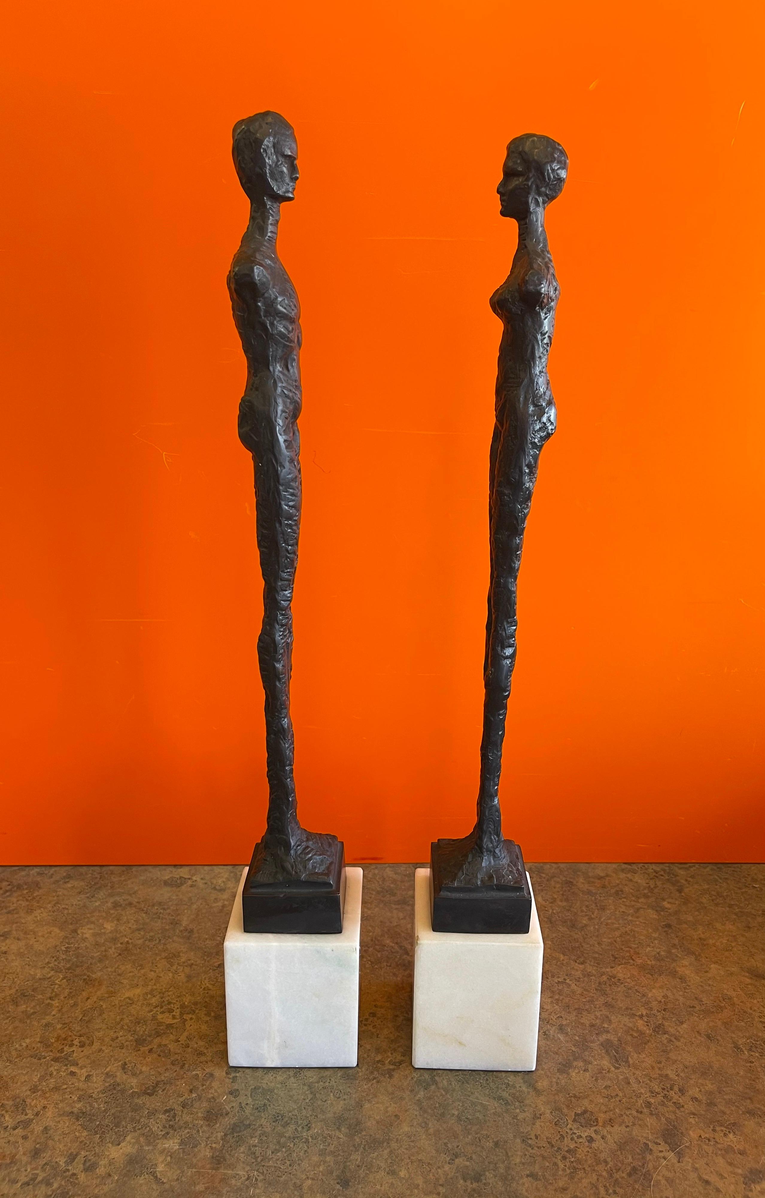 Mid-Century Modern Pair of Figurative Bronze Man & Woman Sculptures in the Style of Giacometti