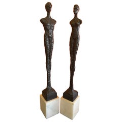 Pair of Figurative Bronze Man & Woman Sculptures in the Style of Giacometti