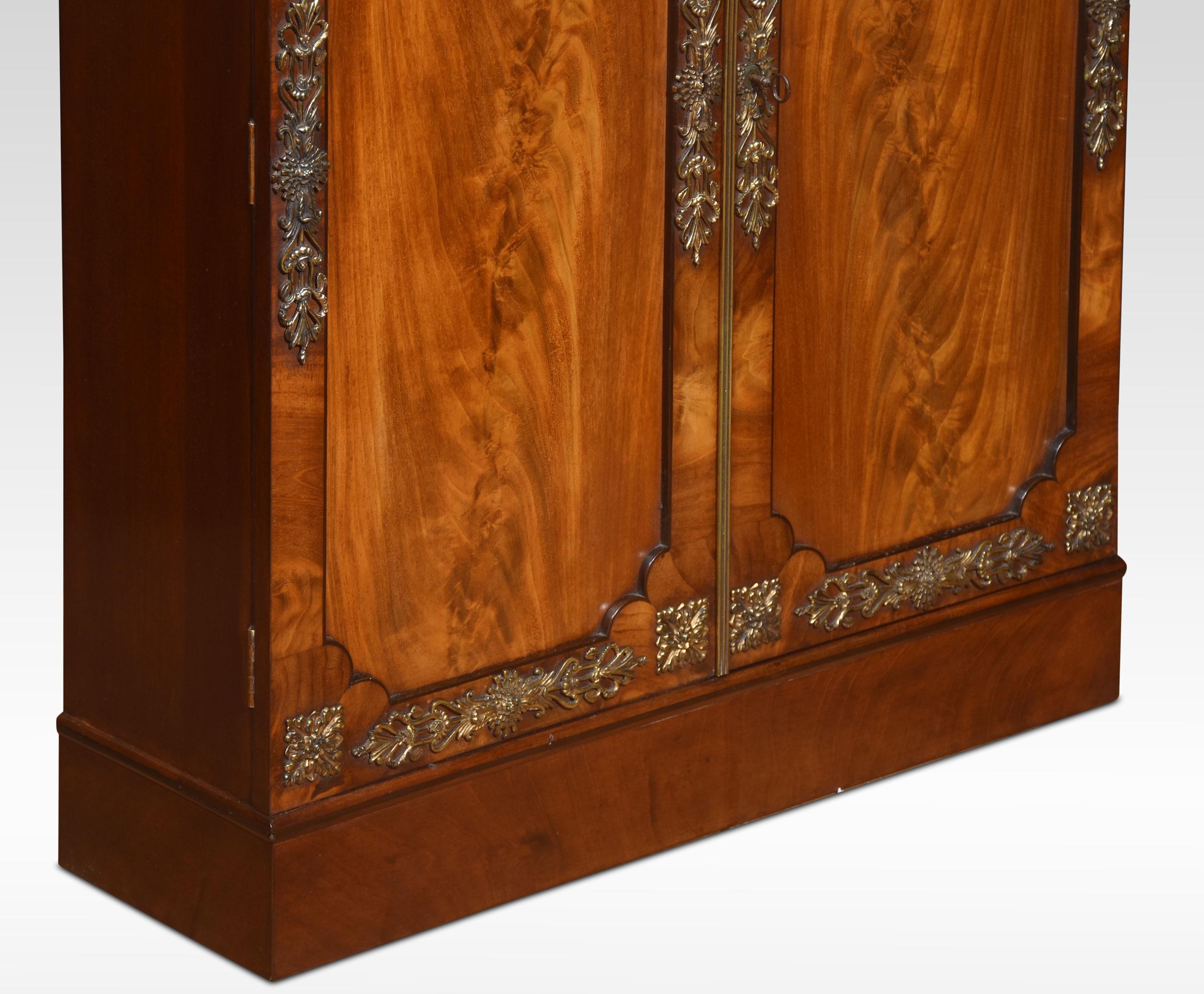 Wood Pair of figured mahogany cabinet For Sale