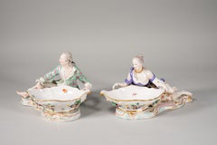 Pair of figurine jam trays. Enameled porcelain. Meissen, late 19th century.