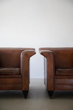 Pair of Fin Armed Sheepskin Leather Chairs by Bart Van Bekhoven