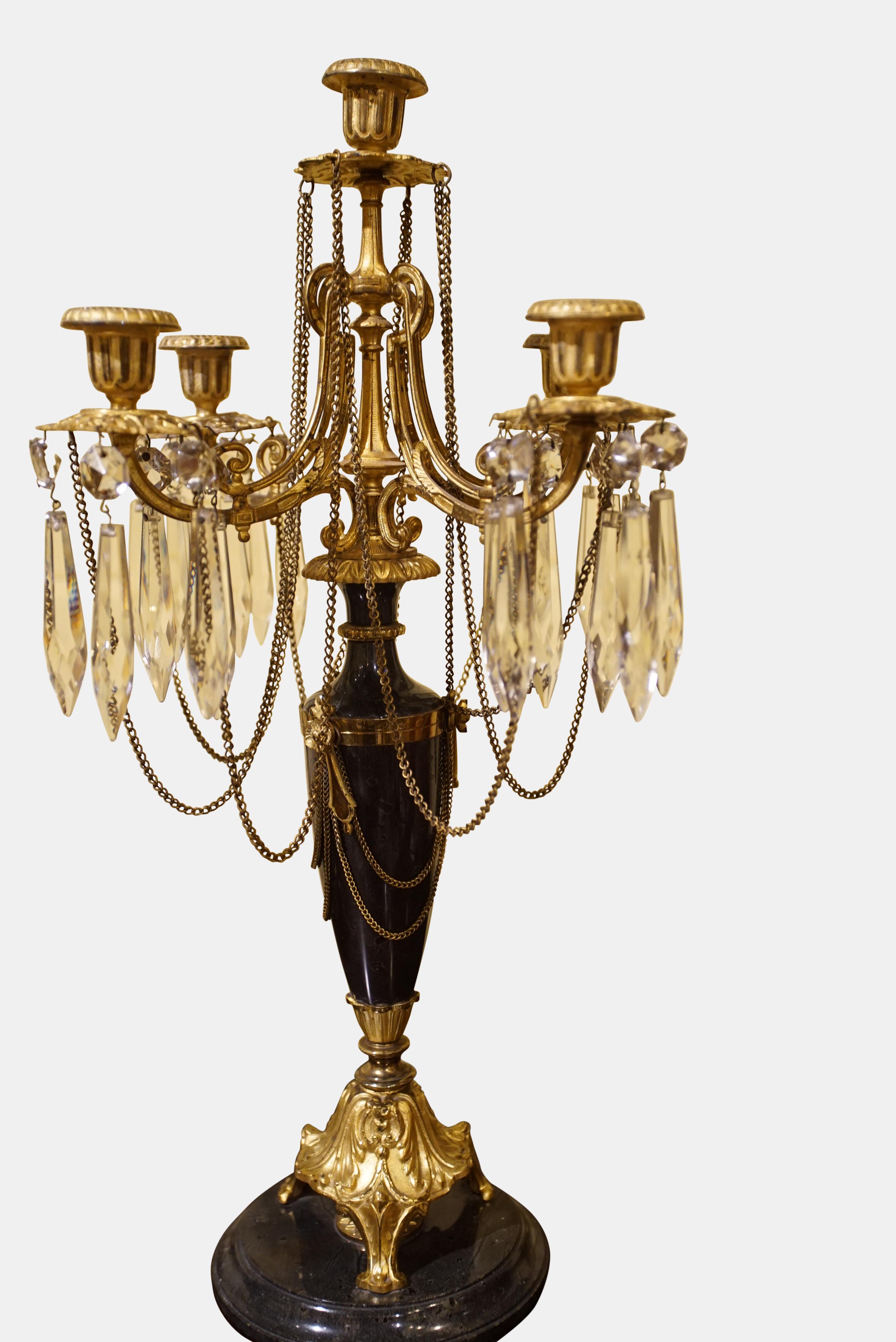 A pair of very fine 19th century gilt bronze and marble candelabra with cut glass lustres, inscribed (in Swedish) and dated 1870.