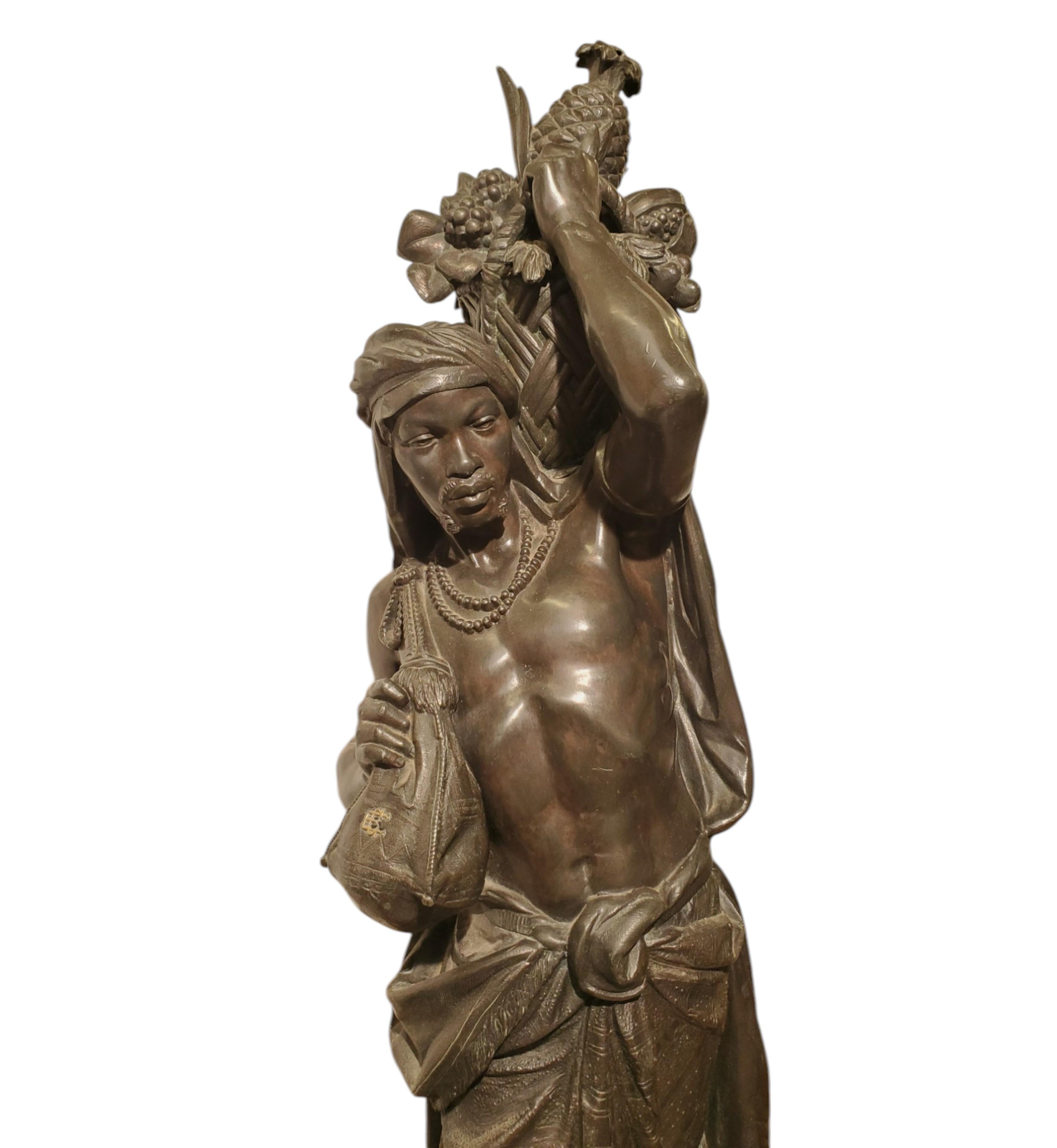  Exquisitely sculpted with meticulous attention to detail, these finely chased metal sculptures by Eugène Cornu offer a remarkably realistic rendition. The male figure is depicted as a young tribal Orientalist man, distinguished by his beard,