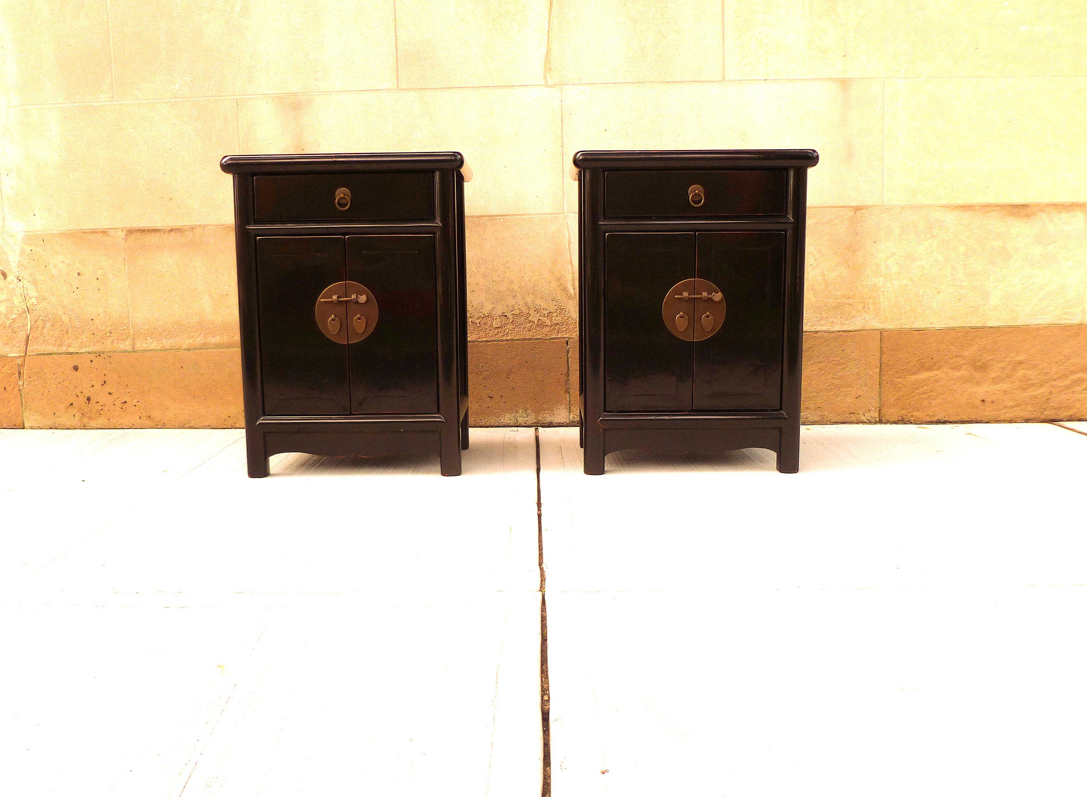 Pair of fine black lacquer chests, each chest with single drawer and a pair of open doors. Simple and elegant. Beautiful color and form. We carry fine quality furniture with elegant finished and has been appeared many times in 
