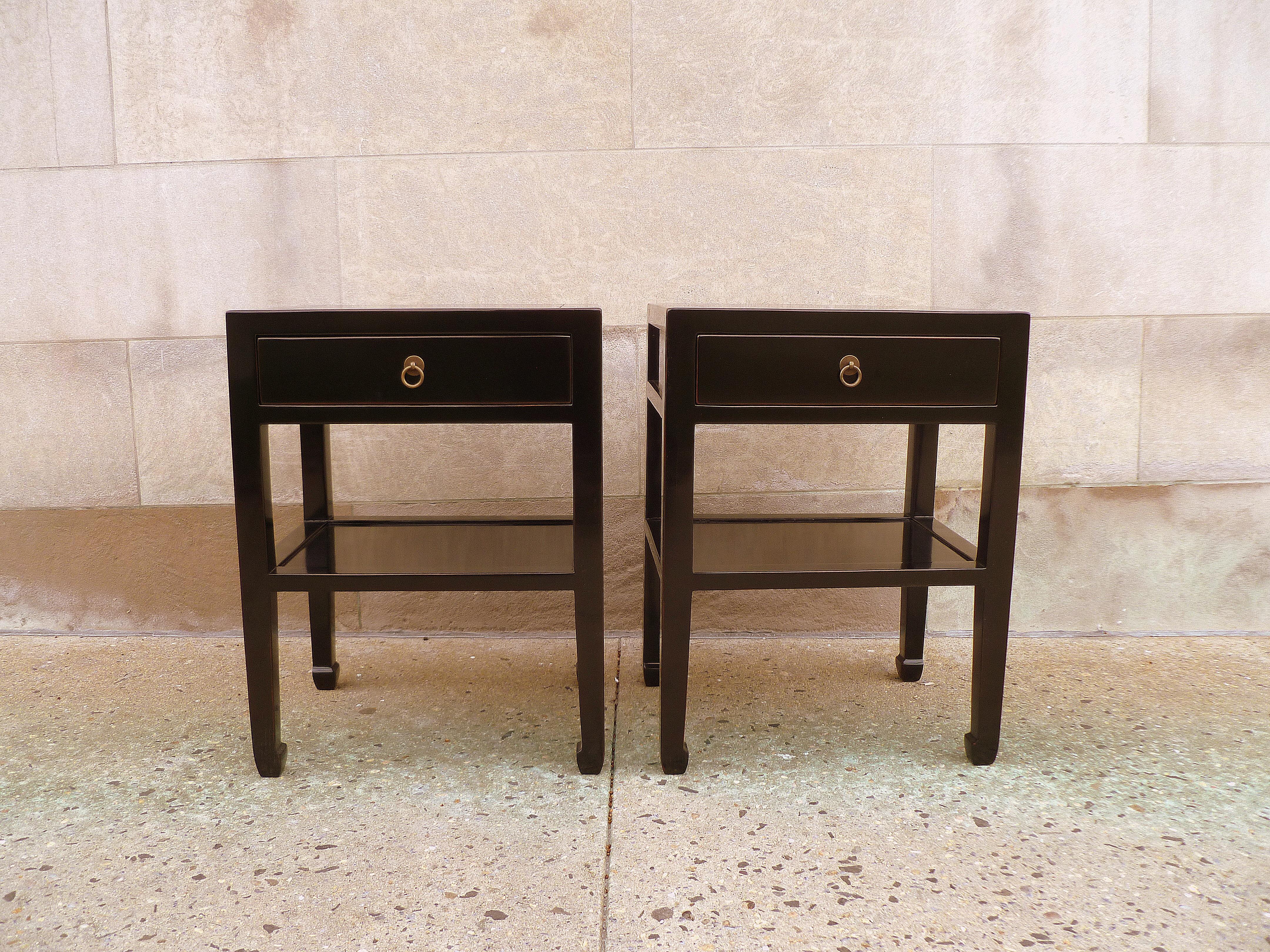 Pair of fine black lacquer end tables, with drawers and shelf. Very elegant and fine quality and beautiful color. We carry fine quality furniture with elegant finished and has been appeared many times in 