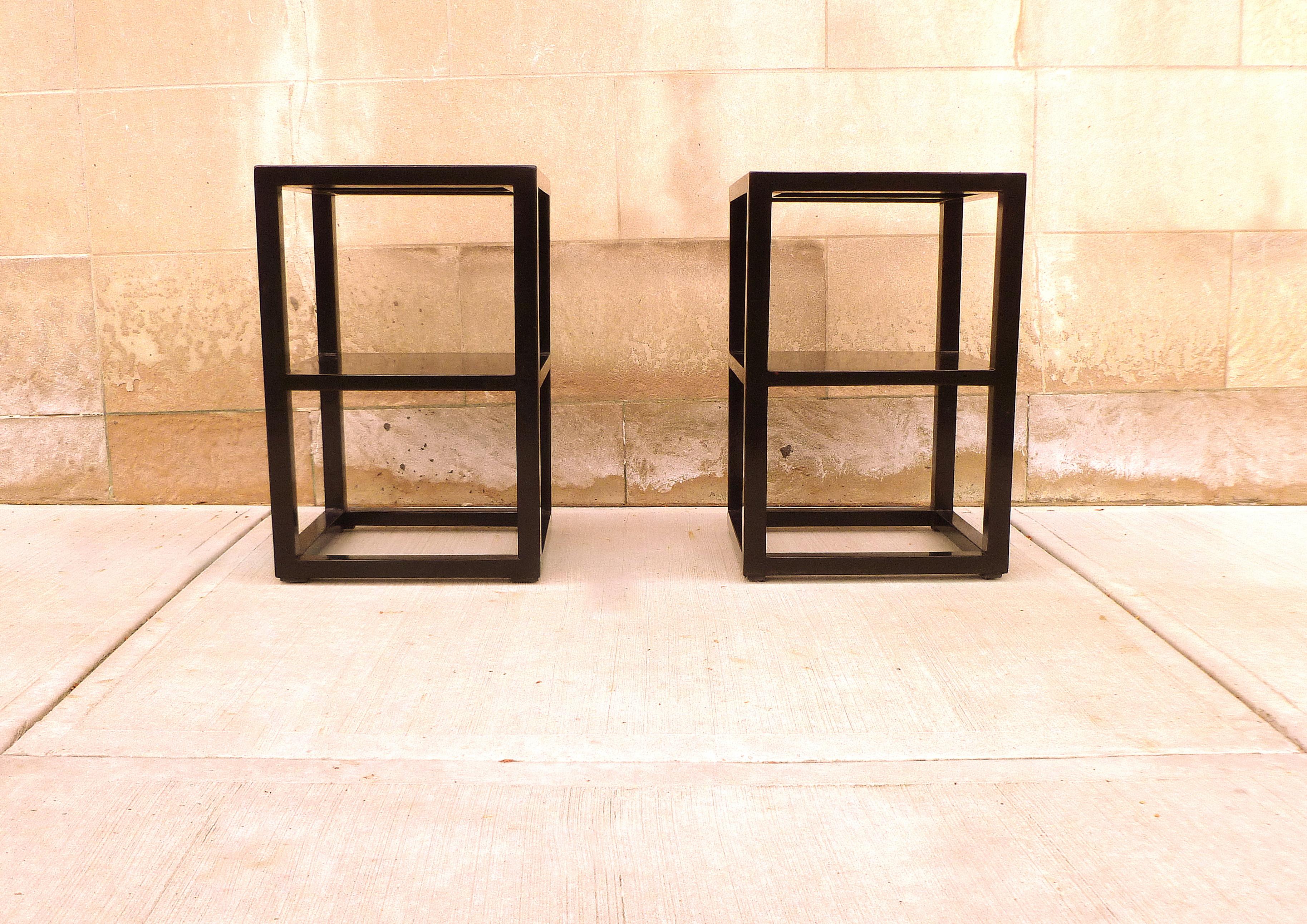 Fine pair of fine black lacquer end tables with shelves. Very elegant and fine black lacquer end tables, beautiful form and color. We carry fine quality furniture with elegant finished and has been appeared many times in 