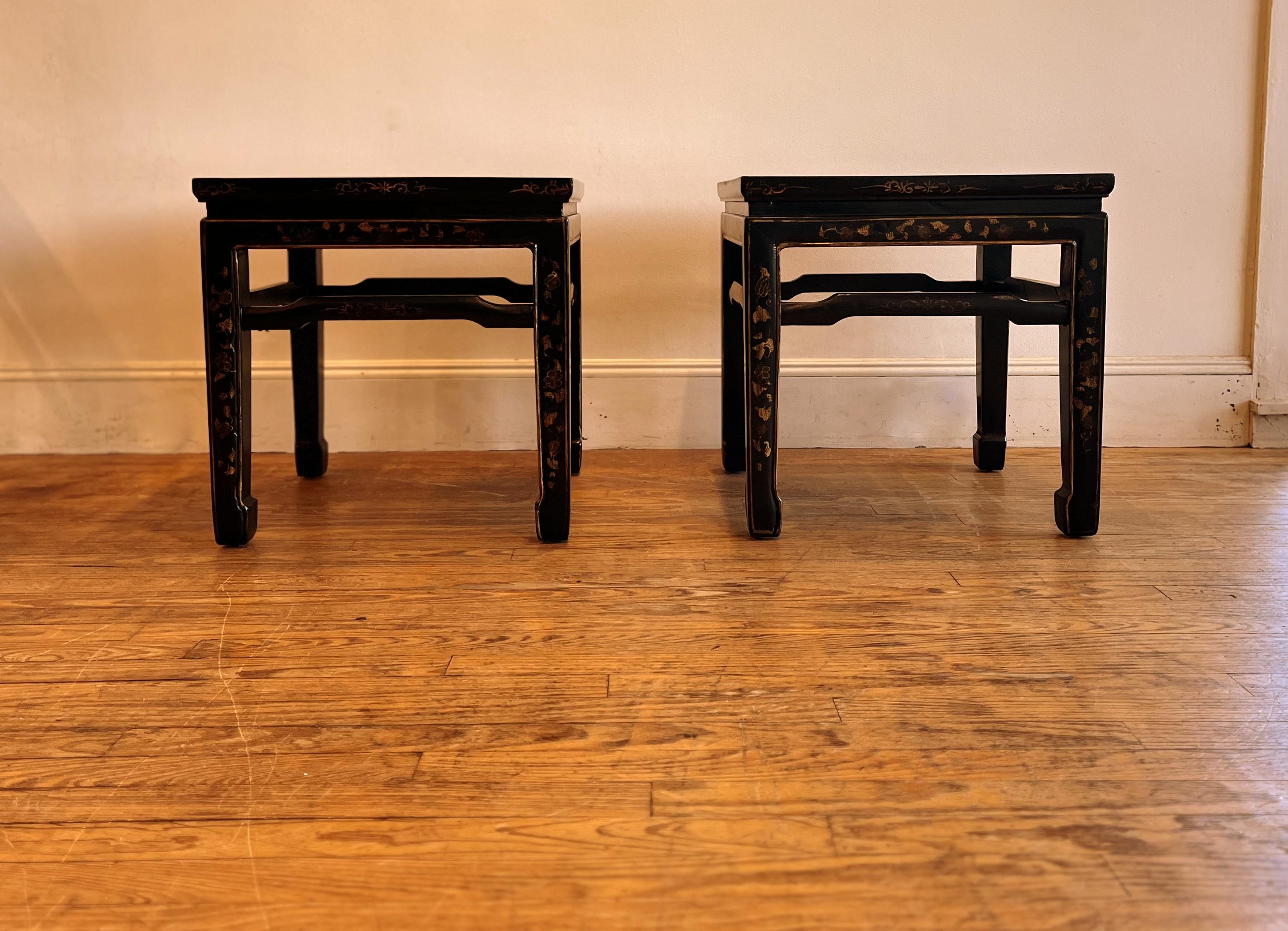 Pair of elegant black lacquer square end tables with gilt motif, beautiful form and color, We carry fine quality furniture with elegant finished and has been appeared many times in 