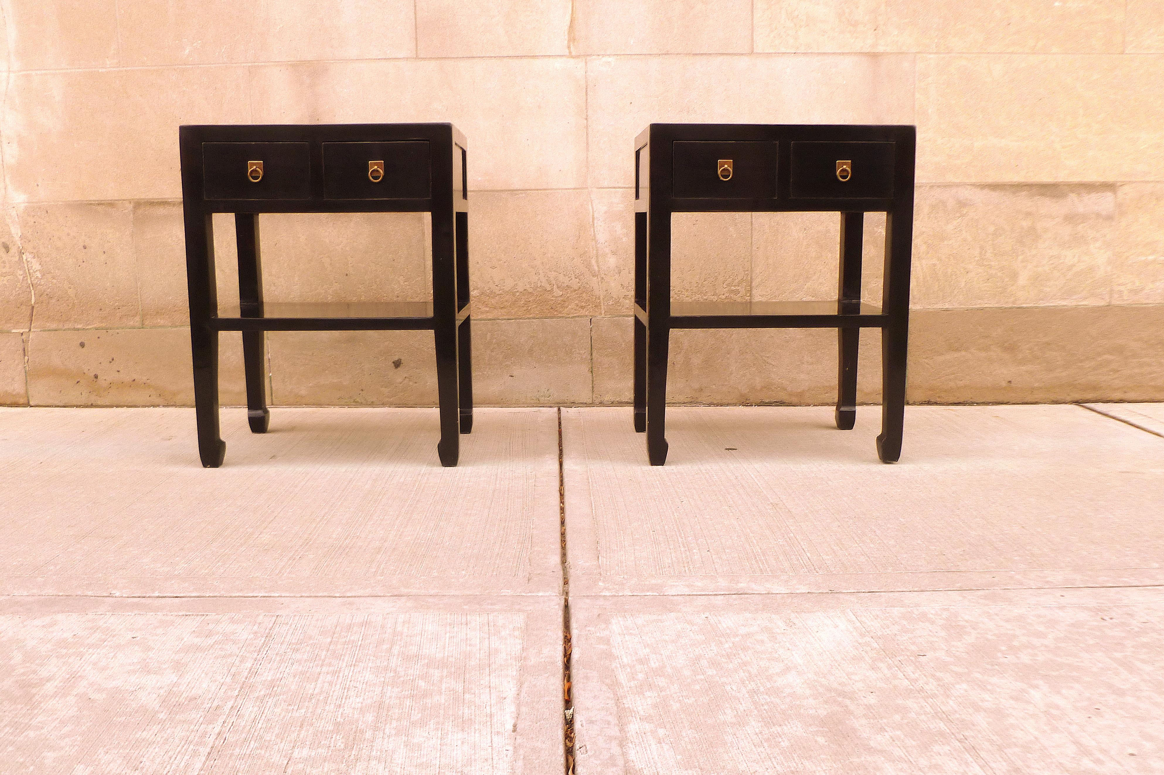 Pair of fine black lacquer tables, with drawers and shelf. Very elegant and fine quality and beautiful color. We carry fine quality furniture with elegant finished and has been appeared many times in 