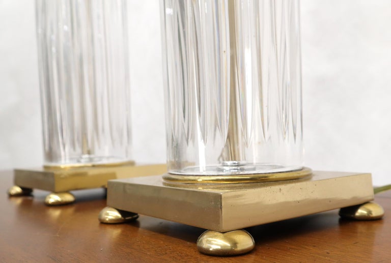 Pair of very fine cut glass table lamps on machined brass square bases.