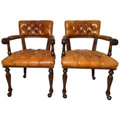 Pair of Fine English Mahogany and Tufted Leather Armchairs