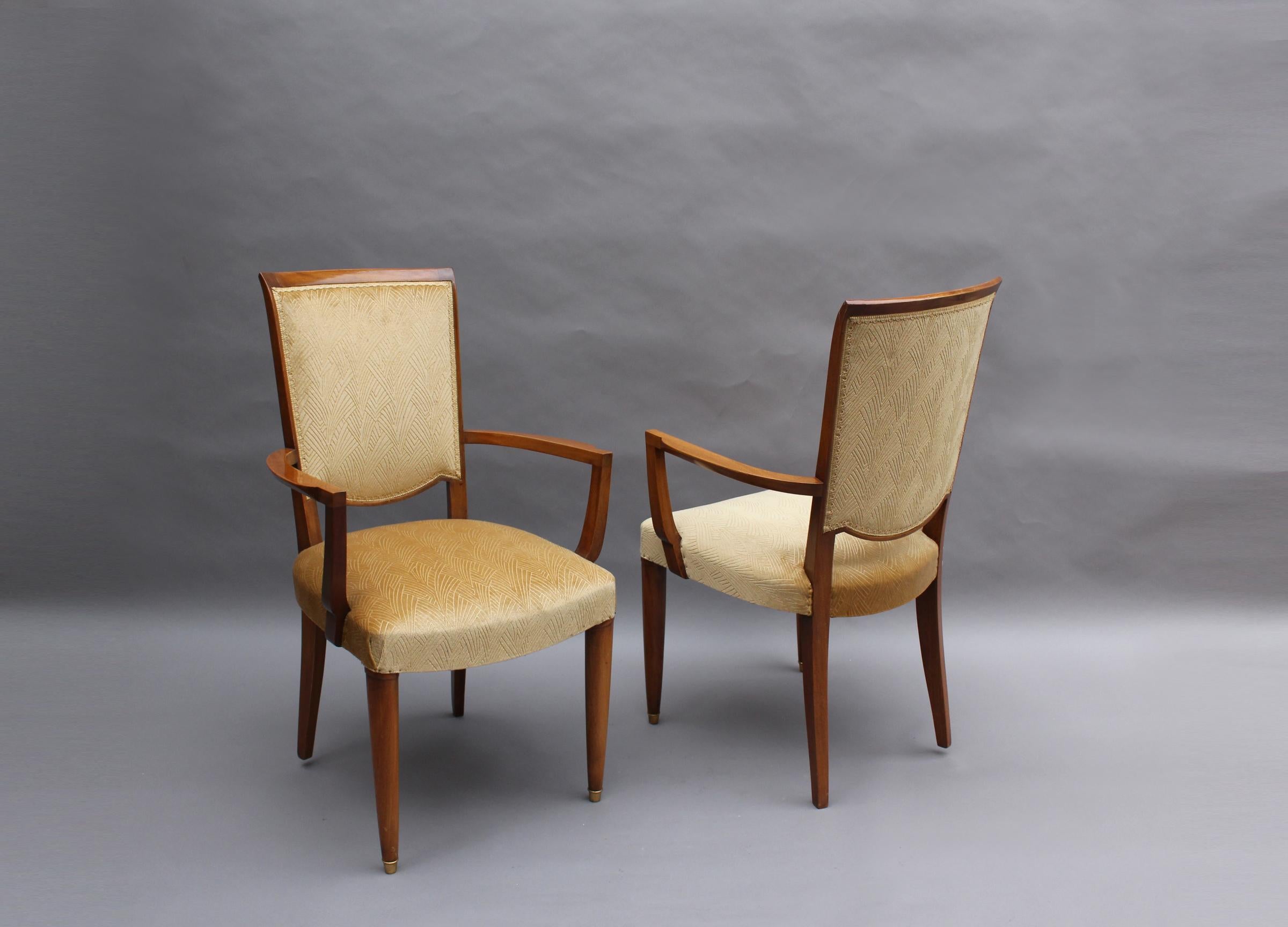 A Pair of fine French Art Deco mahogany bridge armchairs by Jules Leleu.
Price includes refinishing (satin - semi gloss finish). Re-upholstery not included.