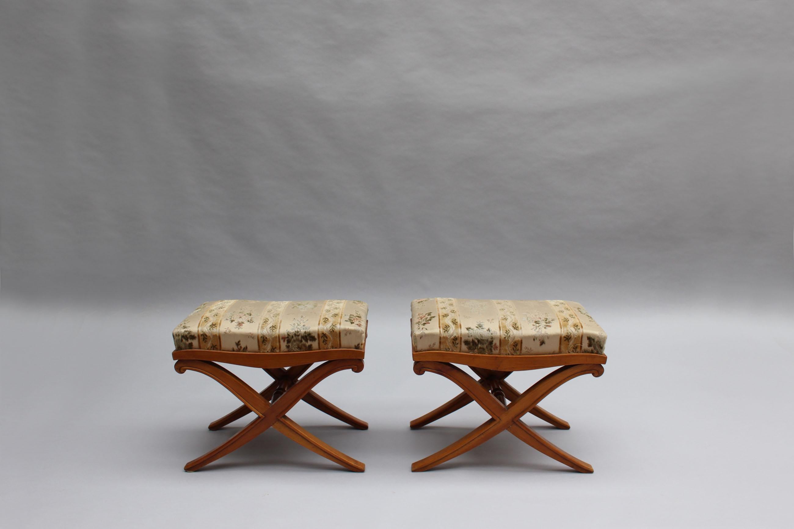 A pair of fine French 1940s X-form stool in cherry wood.