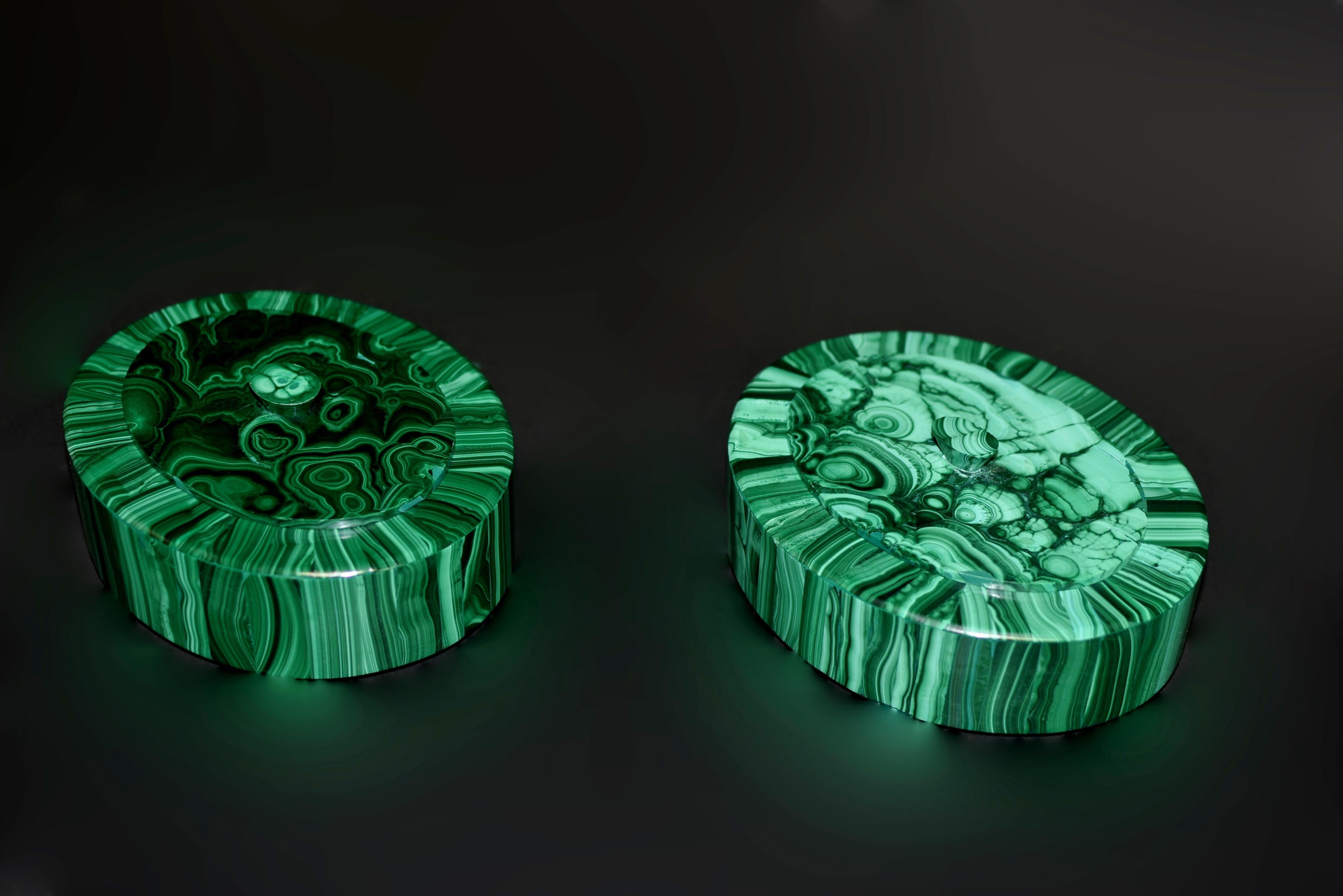 From our Verdant Magnificence collection, this pair of very finely made, highest grade malachite boxes with blue chrysocolla is a heirloom quality objet d'art. Each box of oval form with walls made of carefully chosen malachite of stripe pattern,