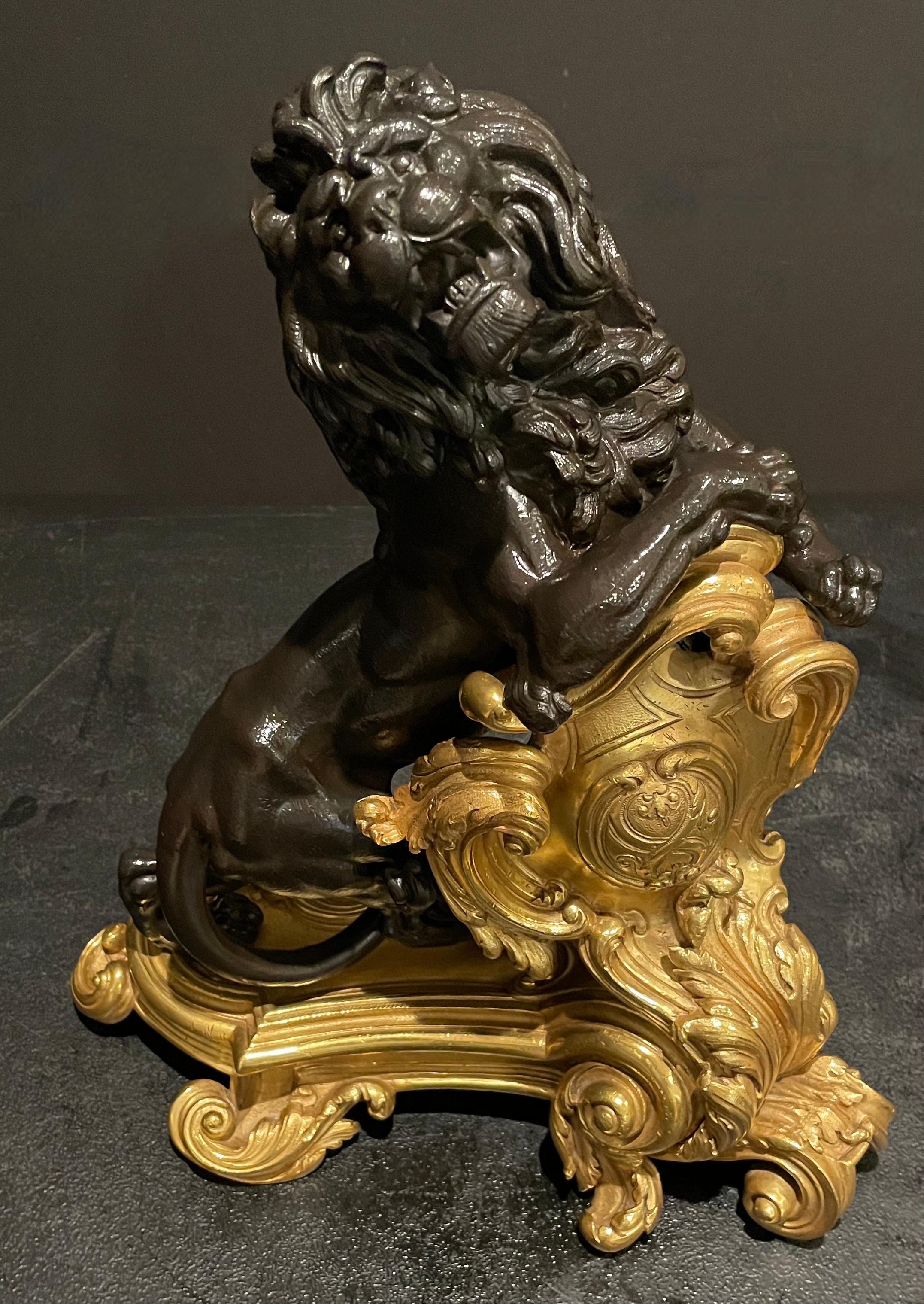 French Fine Pair Of Figural Patinated and Gilt Lion Chenets For Sale