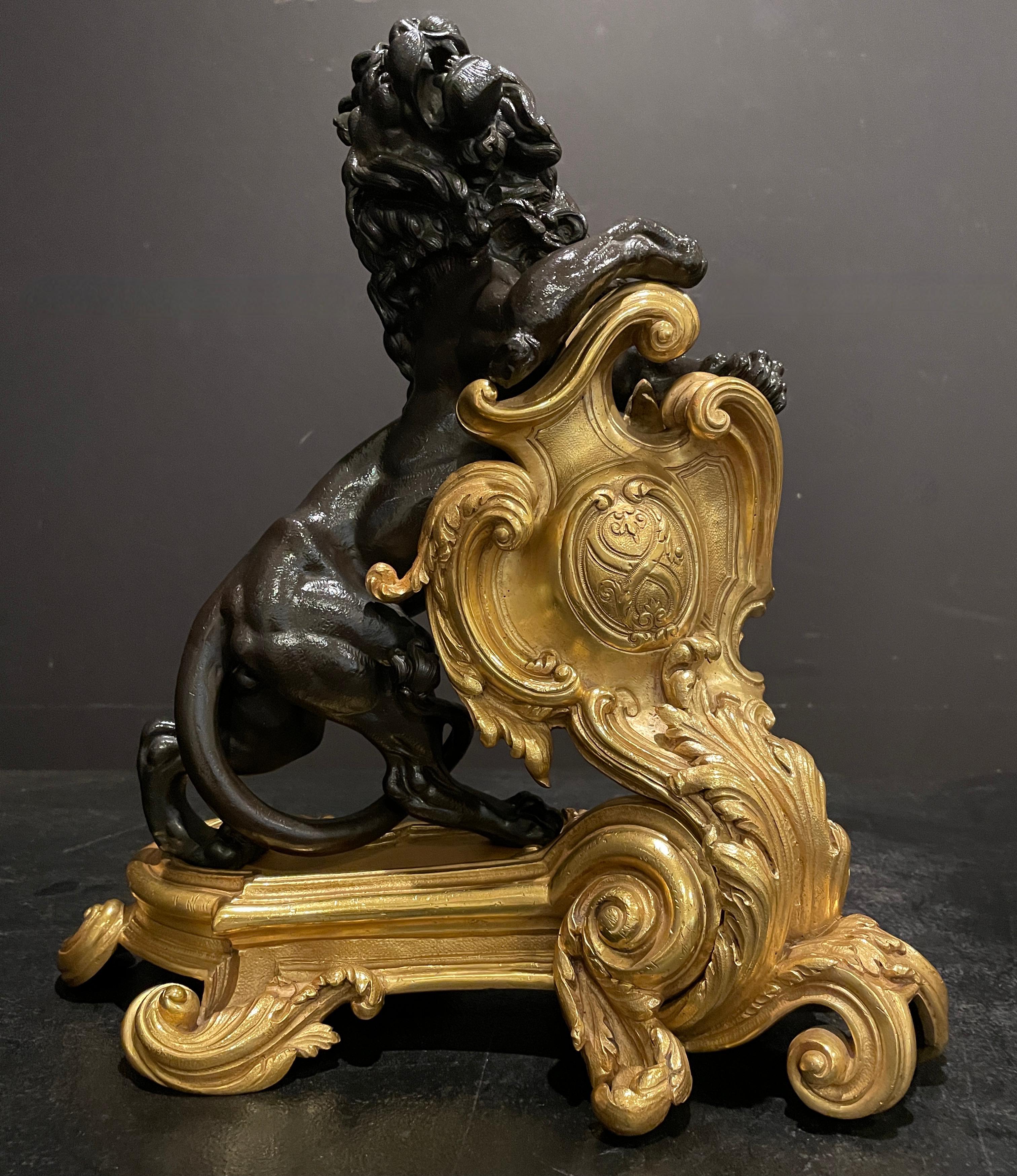 Fine Pair Of Figural Patinated and Gilt Lion Chenets In Good Condition For Sale In Norwood, NJ