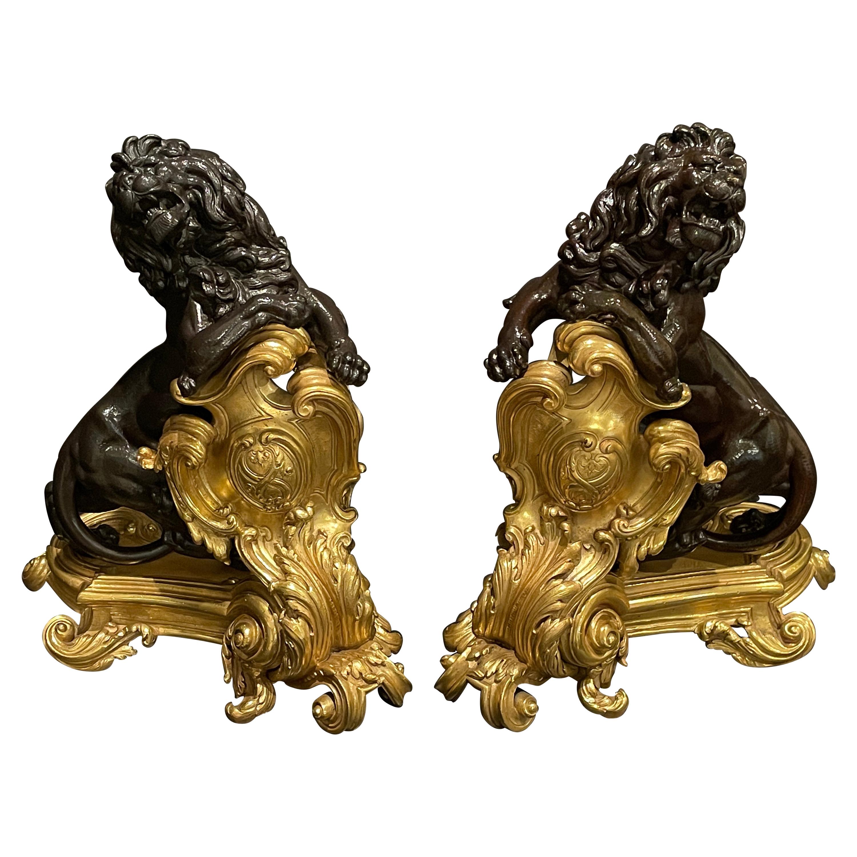 Fine Pair Of Figural Patinated and Gilt Lion Chenets For Sale