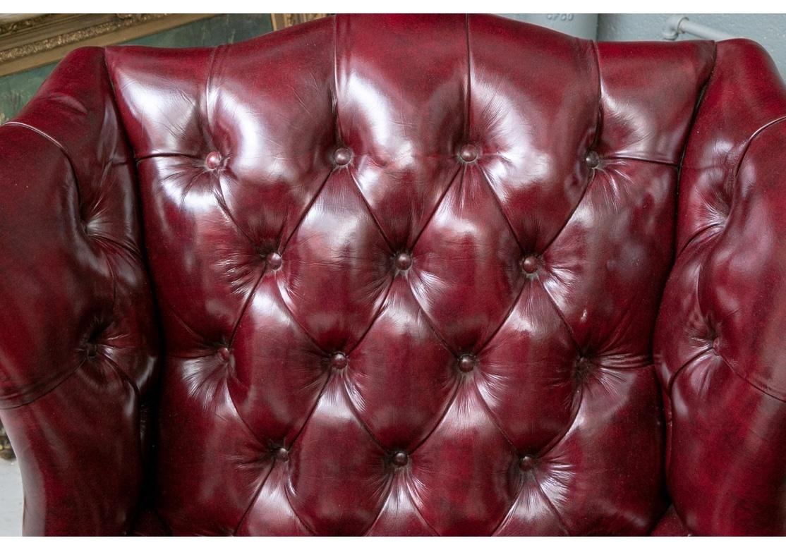 20th Century Pair Of Fine Quality Glazed Oxblood Leather Wing Chairs