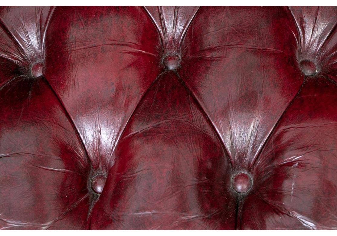 Pair Of Fine Quality Glazed Oxblood Leather Wing Chairs 1
