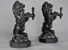 Pair of Fine Quality Late 19th Century Cast Iron Fire Dogs in the Form of Lions