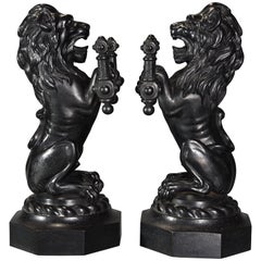 Pair of Fine Quality Late 19th Century Cast Iron Fire Dogs in the Form of Lions