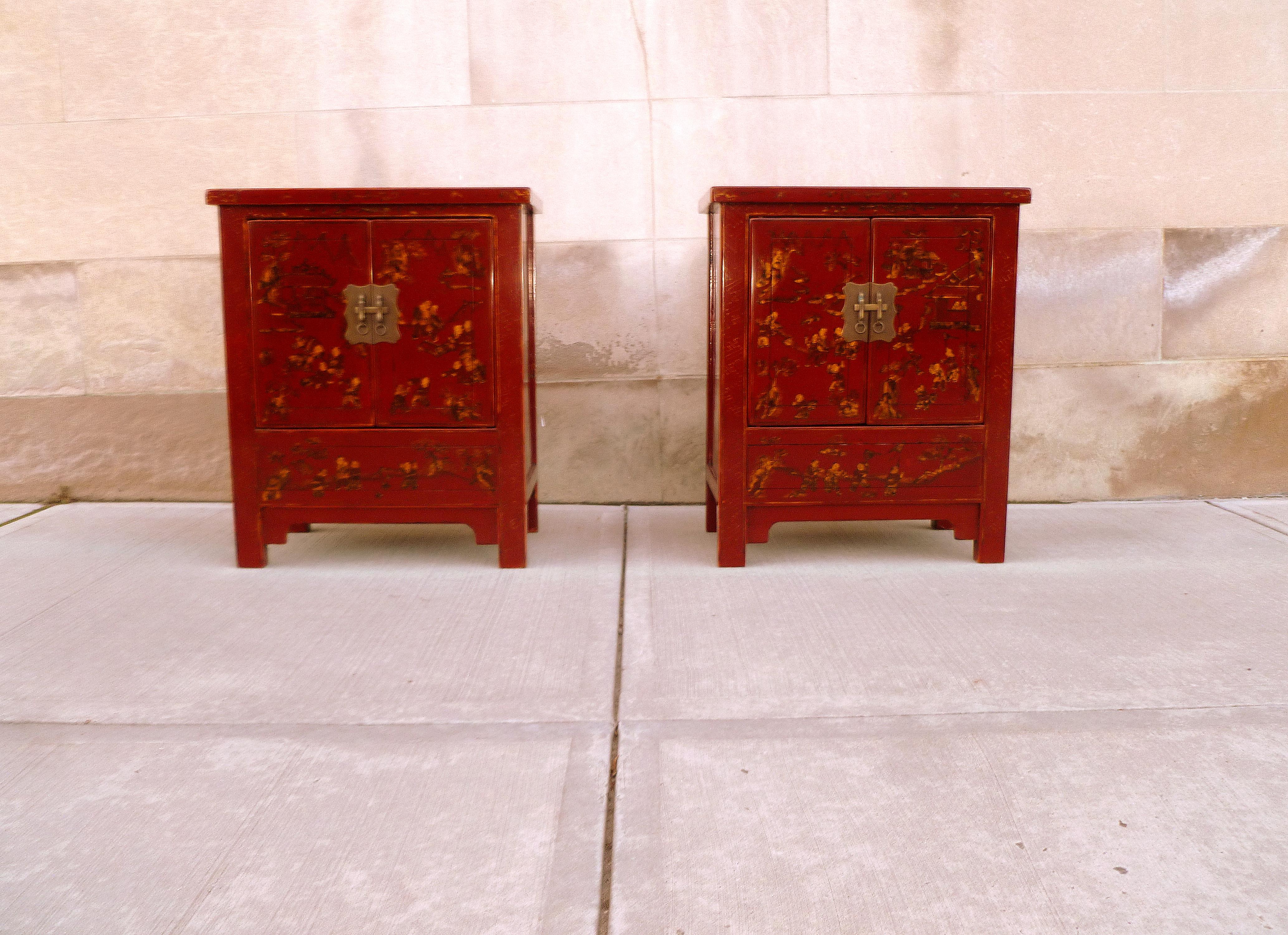 A pair of fine red lacquer chests with hand-painted gold gilt motif, beautiful color, form and lines.