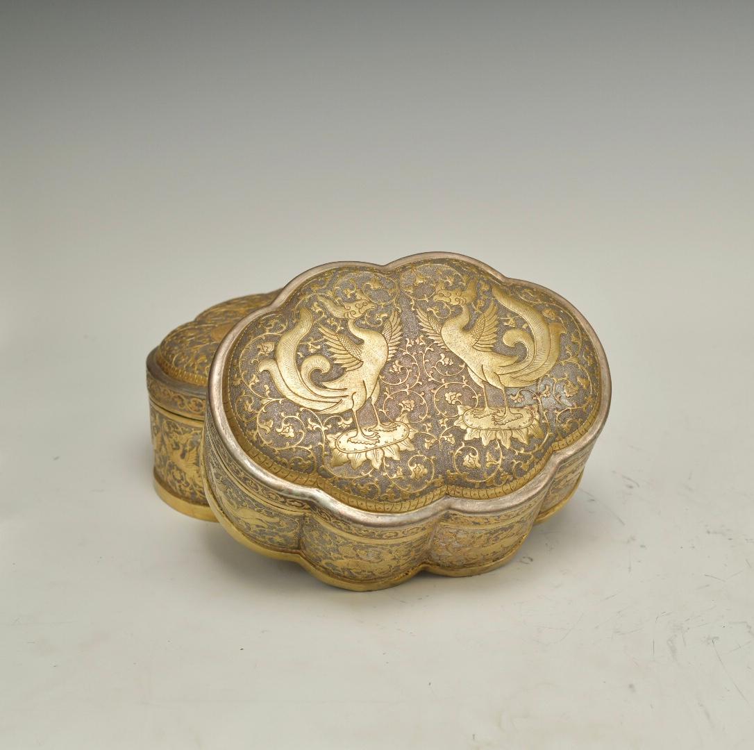 Fine repousse parcel-gilt and silvered copper boxes with dragon and phoenix decorations. From northern part of China, 20th century.
 