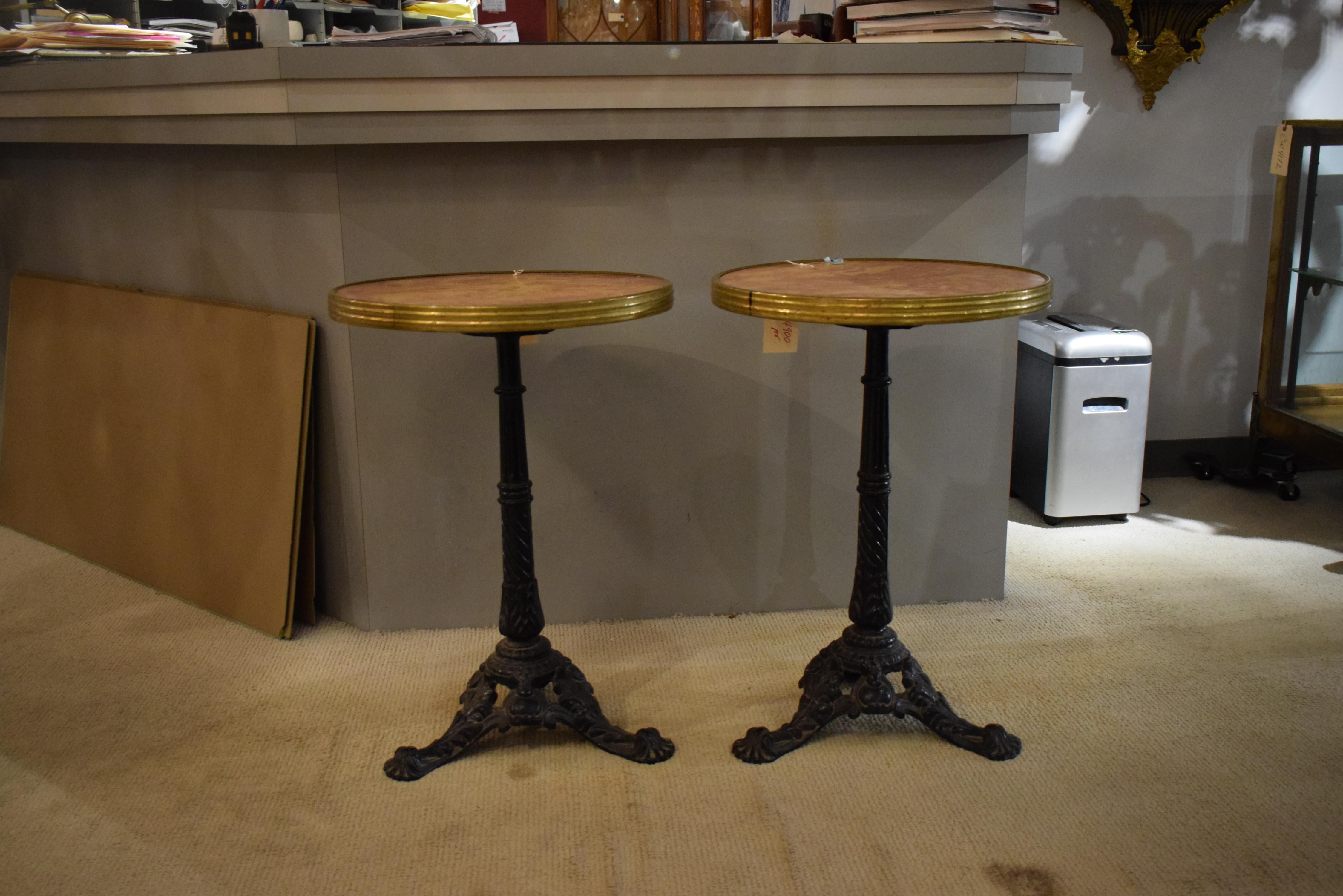 Pair of Fine round marble top bistro tables.
