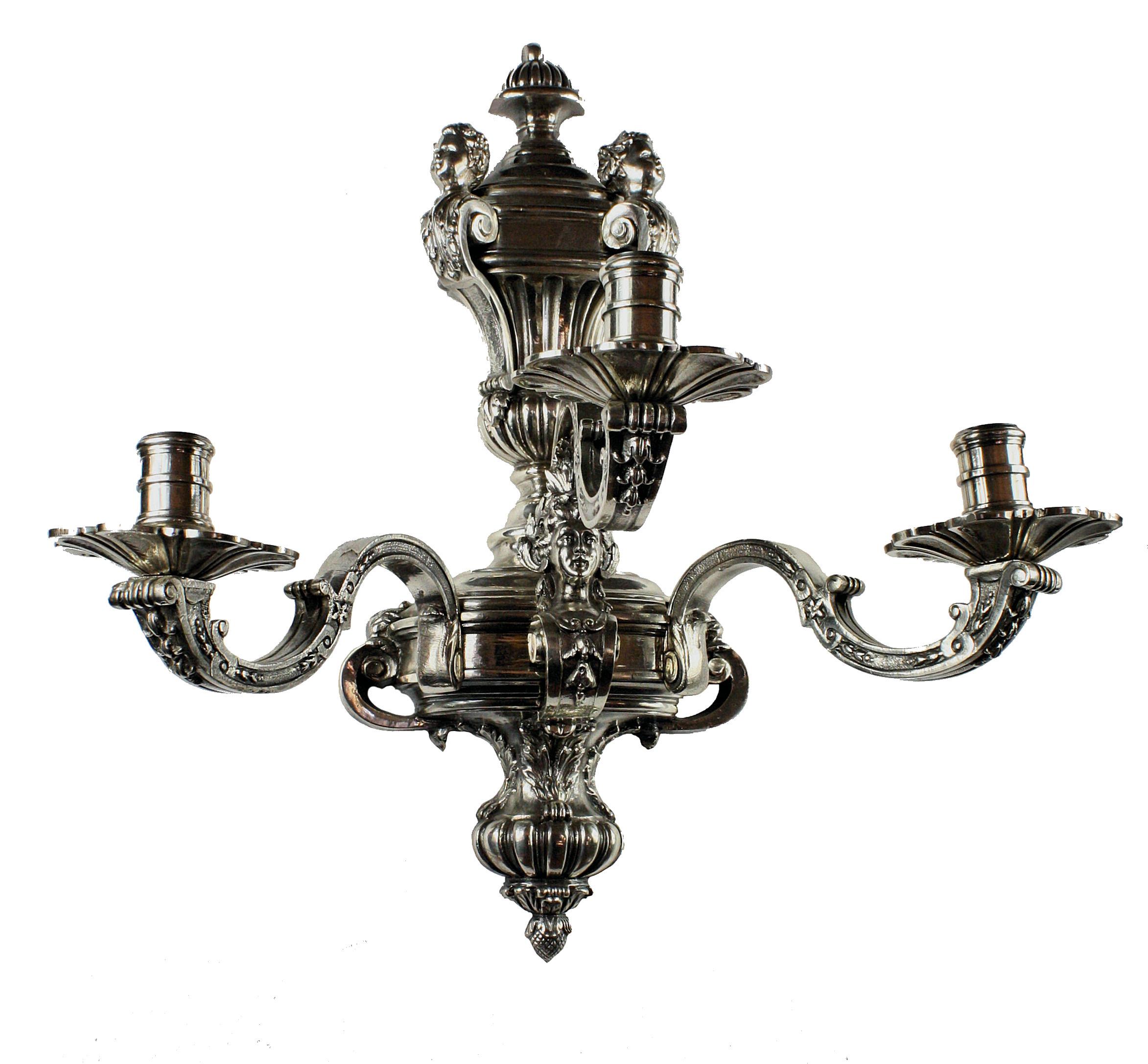 A pair of fine English, silver plated bronze copies of the Knole wall light. These are 19th century copies and the quality of the bronze work and burnishing is superb. Inferior copies of the Knole lights became fashionable in the 1920s and 1930s but