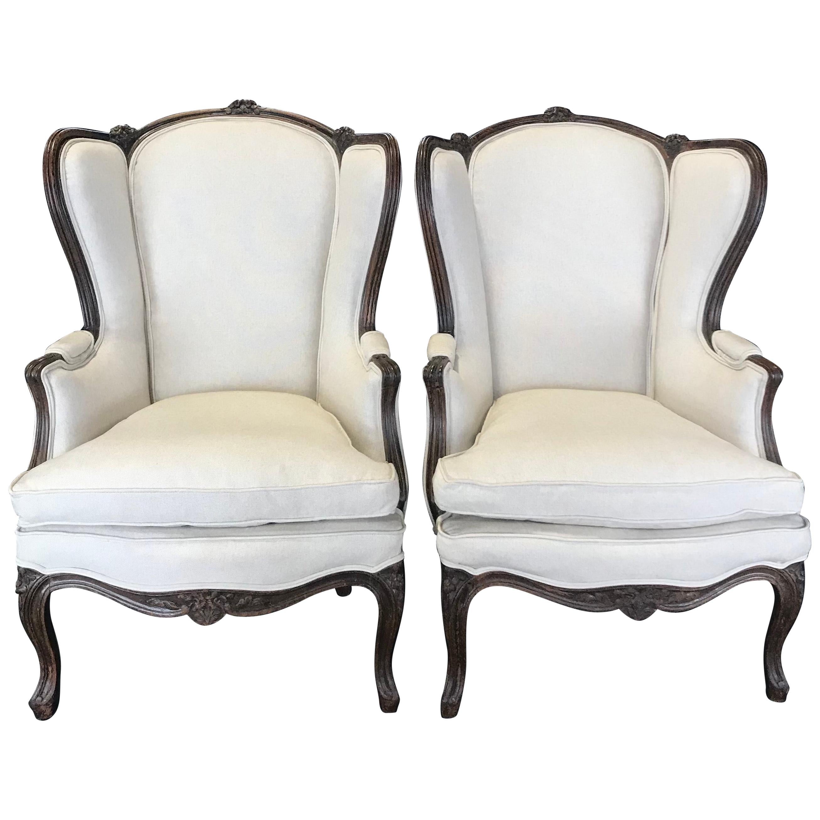 Pair of Finely Carved 19th Century French Louis XV Wing Armchairs