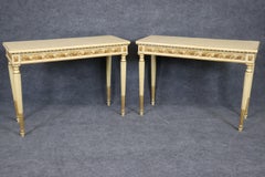 Pair of Finely Carved Creme Painted Gilded French Louis XVI Style Console Tables