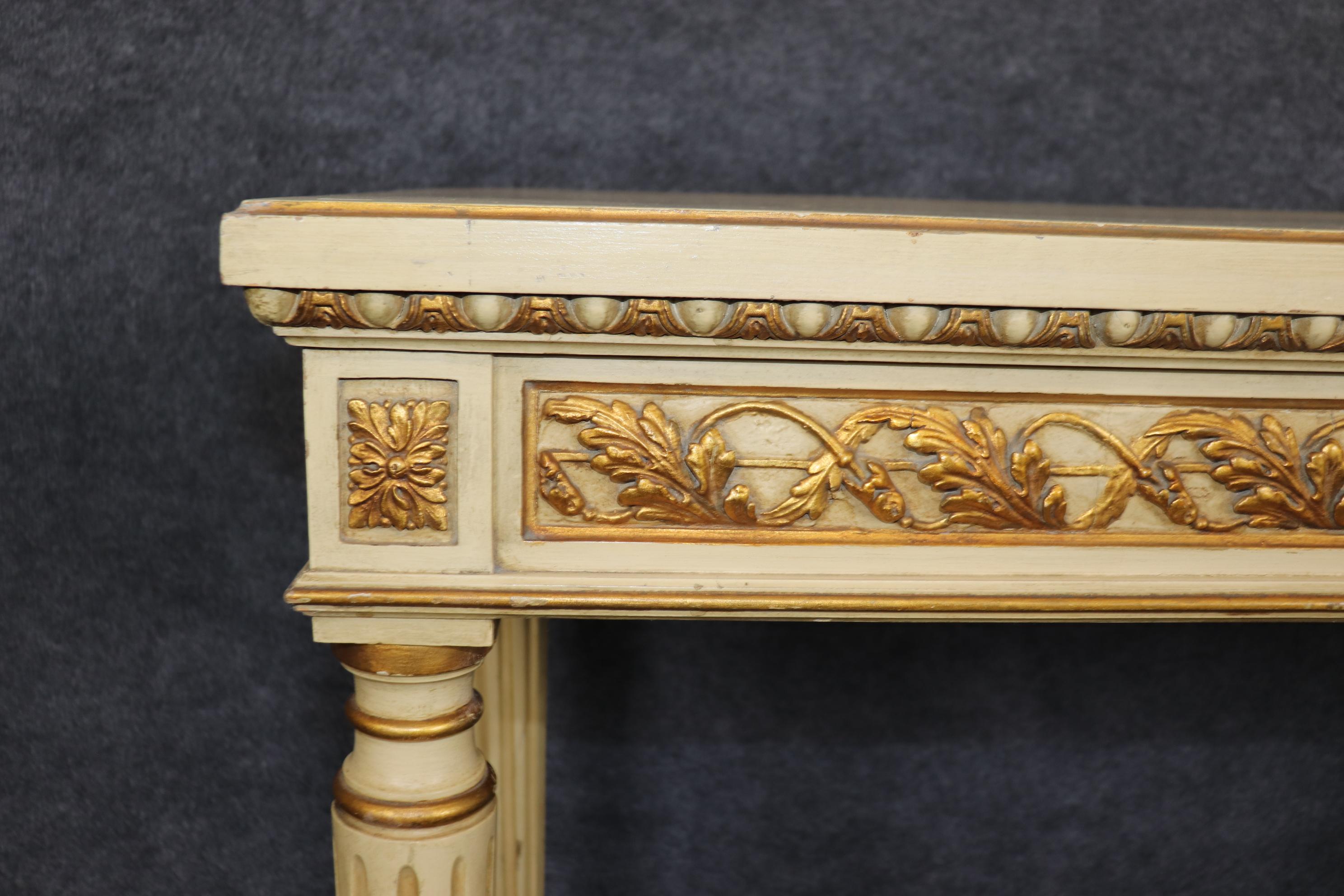 Pair of Finely Carved Creme Painted Gilded French Louis XVI Style Console Tables In Good Condition For Sale In Swedesboro, NJ