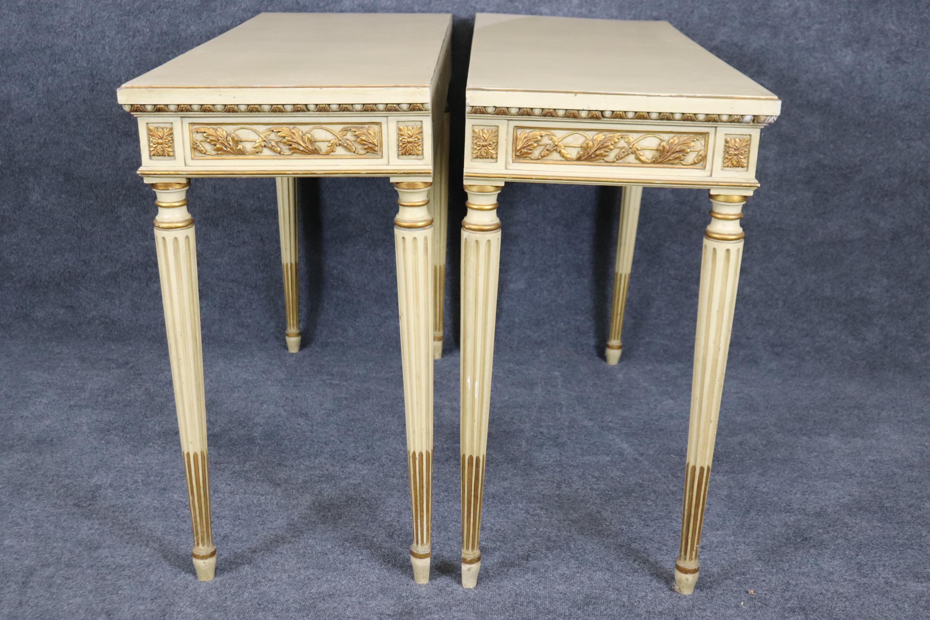 Pair of Finely Carved Creme Painted Gilded French Louis XVI Style Console Tables For Sale 1