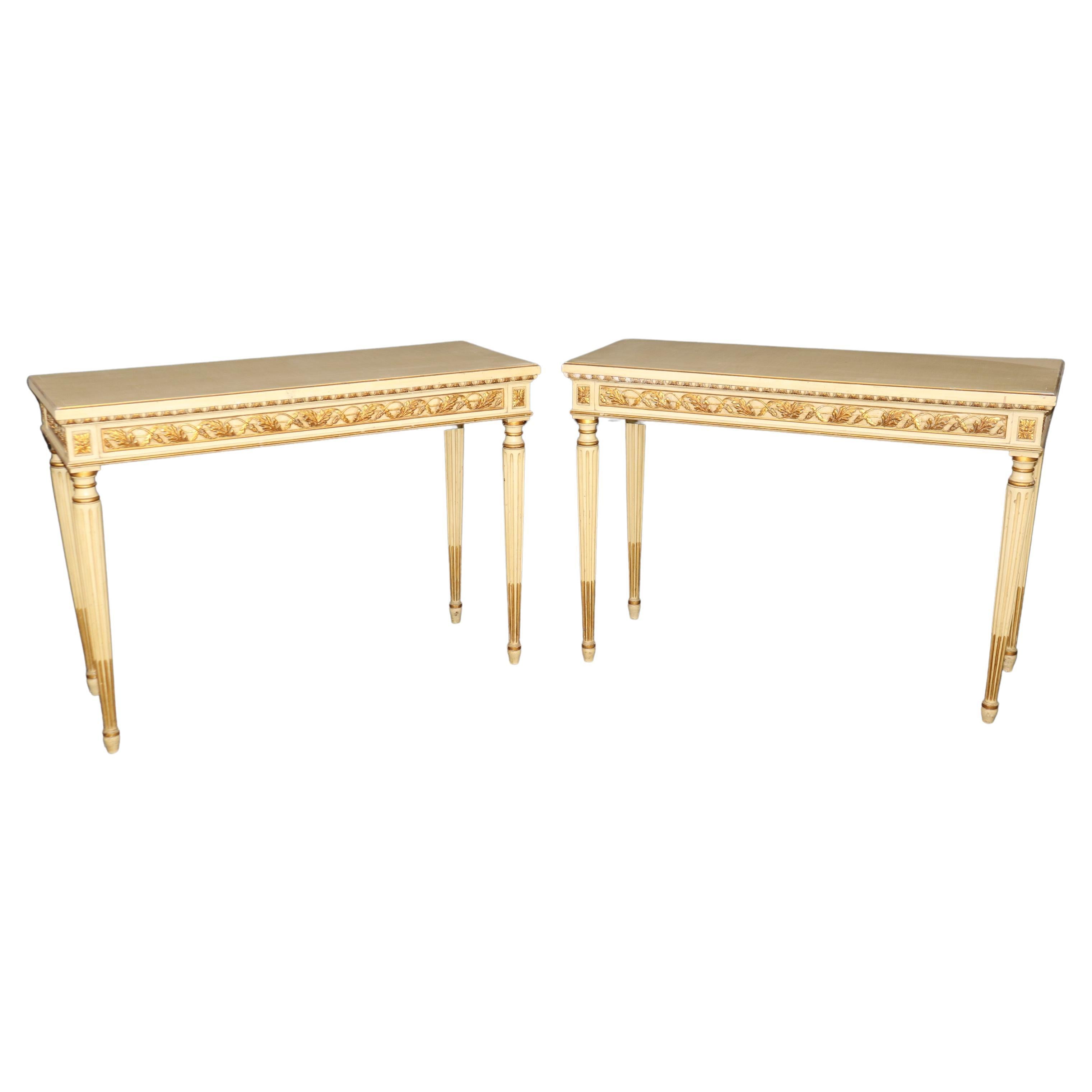 Pair of Finely Carved Creme Painted Gilded French Louis XVI Style Console Tables For Sale